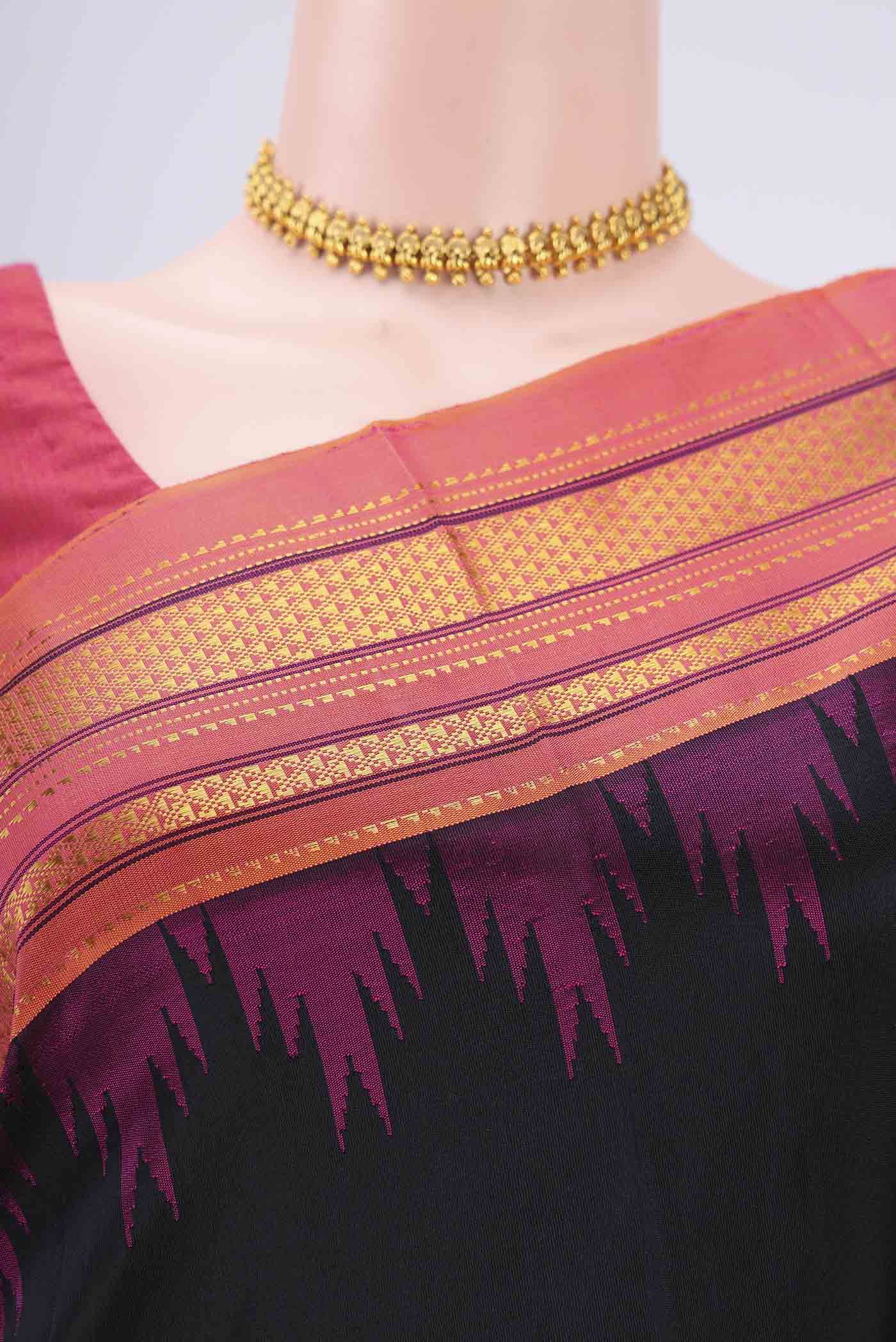 Border image of Black Bangalore Silk Saree with Plain Body and Temple Border. 