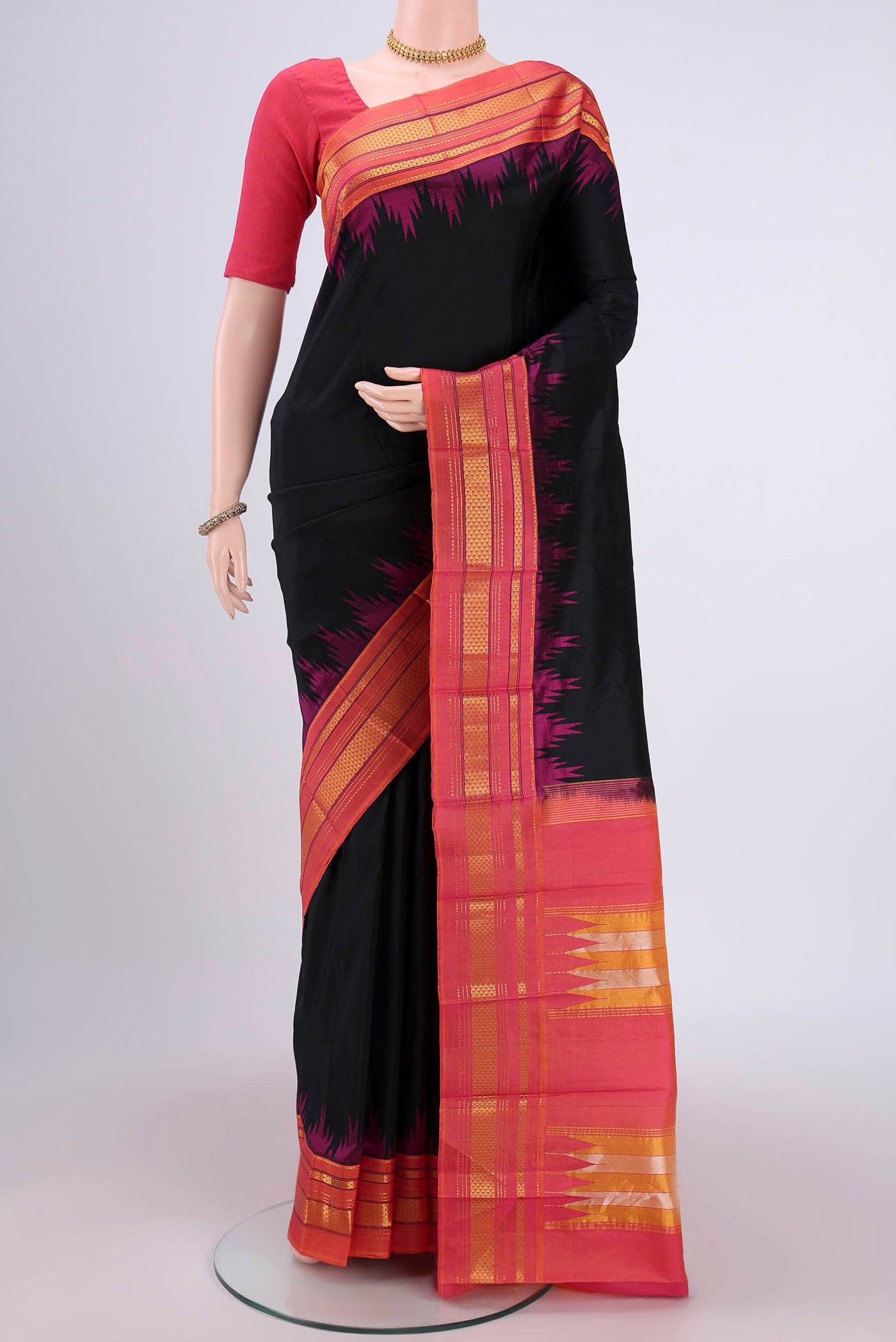 Black Bangalore Silk Saree with Plain Body and Temple Border.  displayed on a mannequin