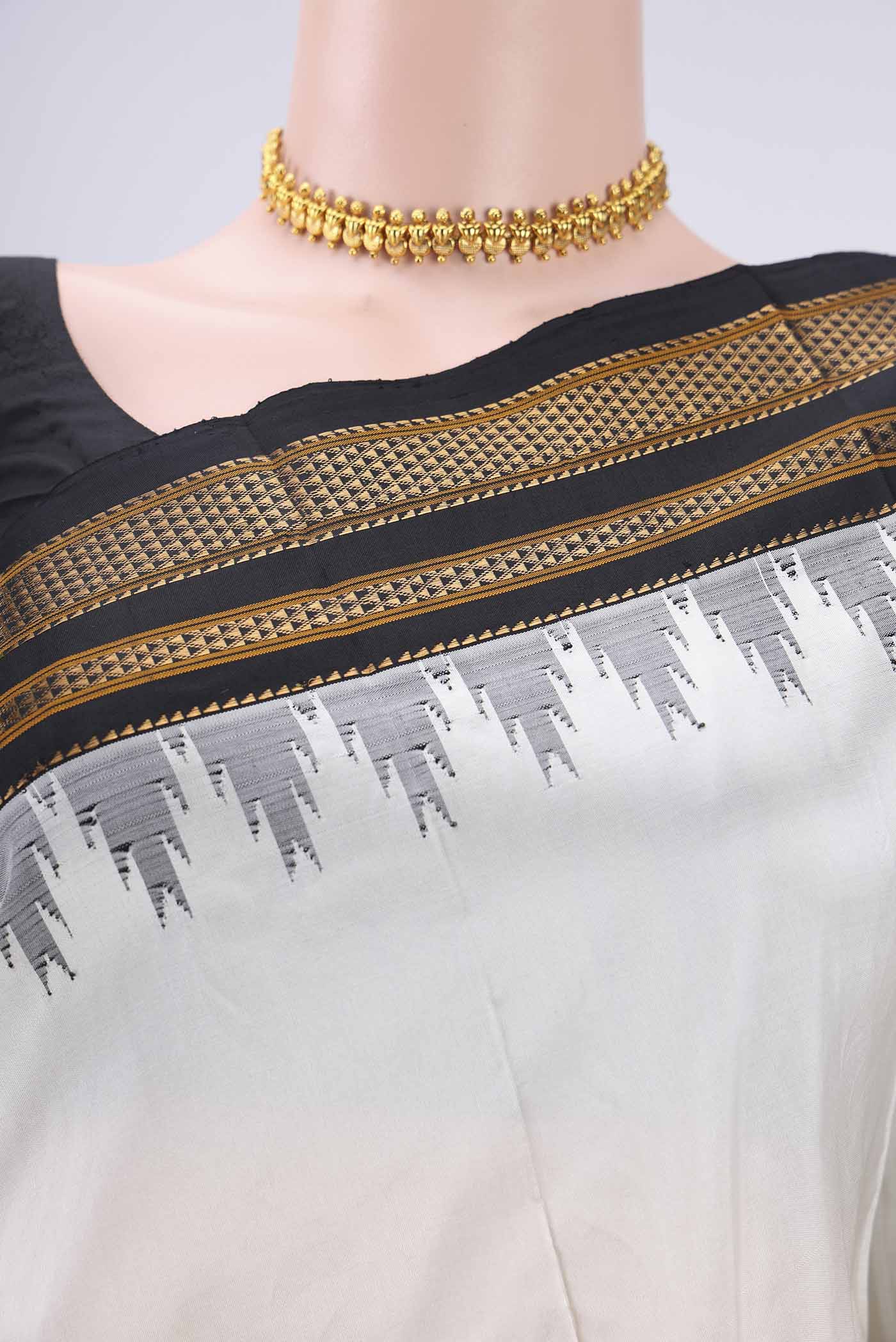 Border image of Off White Bangalore Silk Saree with Plain Body and Temple Border. 