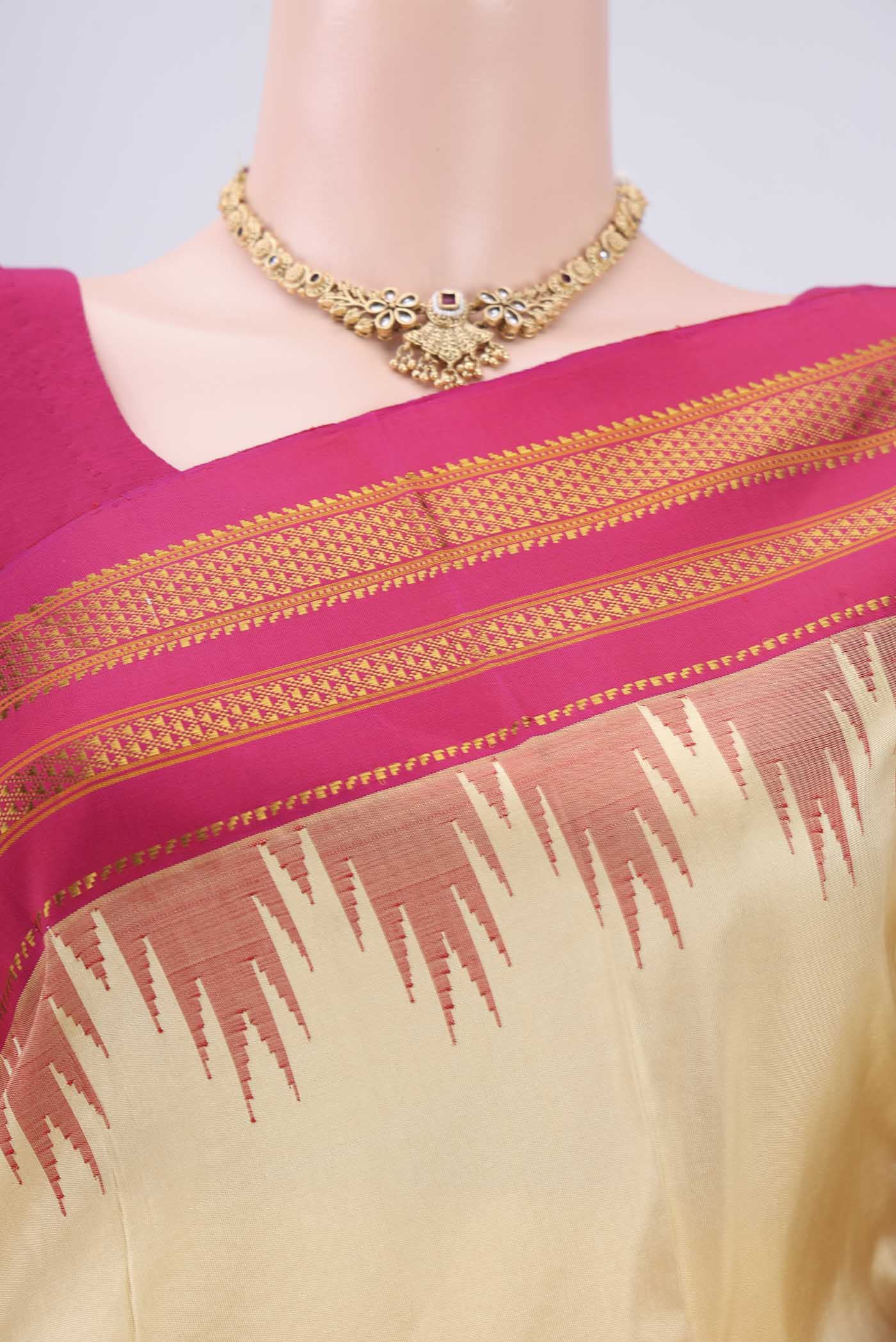 Border image of Cream Bangalore Silk Saree with Plain Body and Temple Border. 