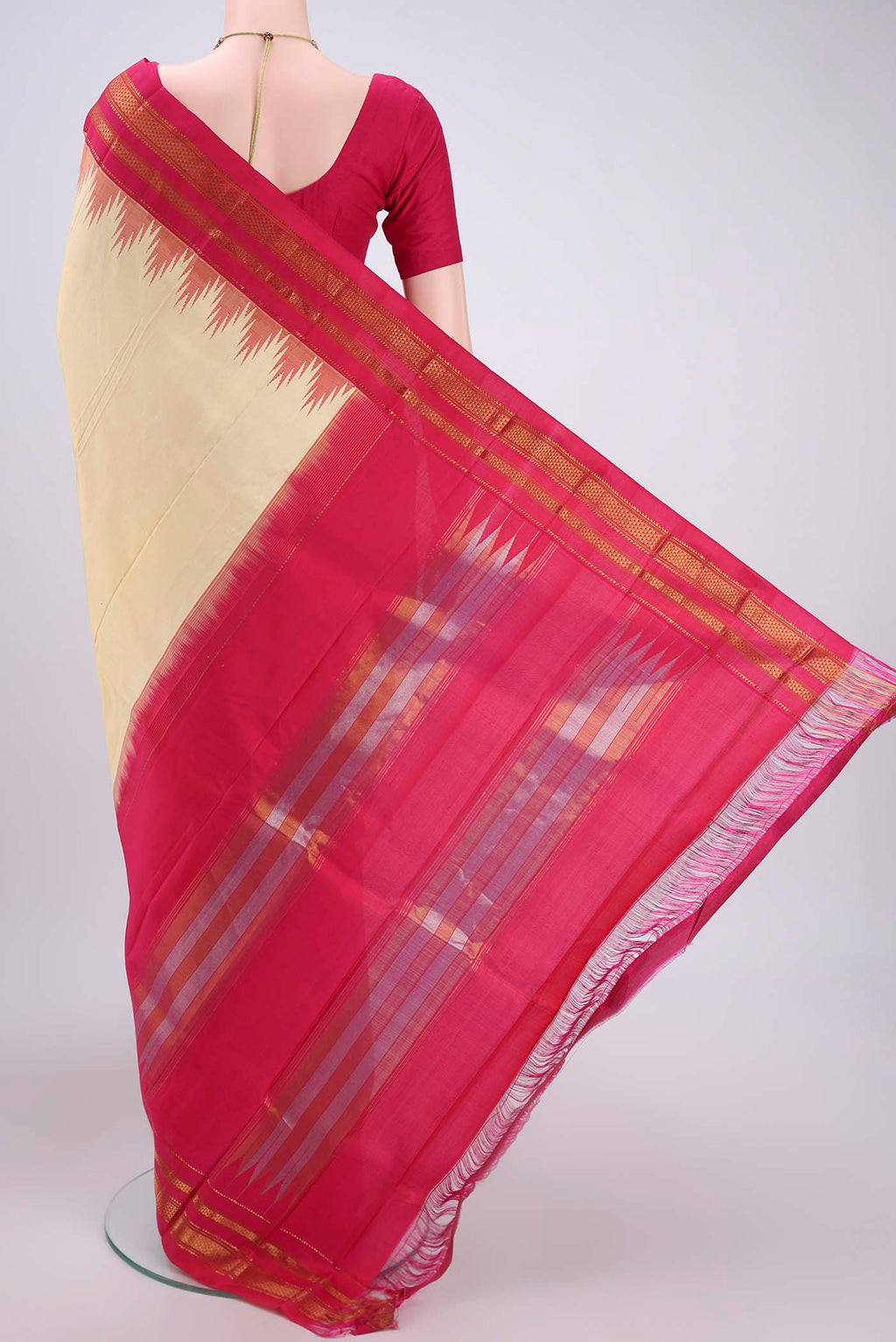 Flat view of Cream Bangalore Silk Saree with Plain Body and Temple Border. 