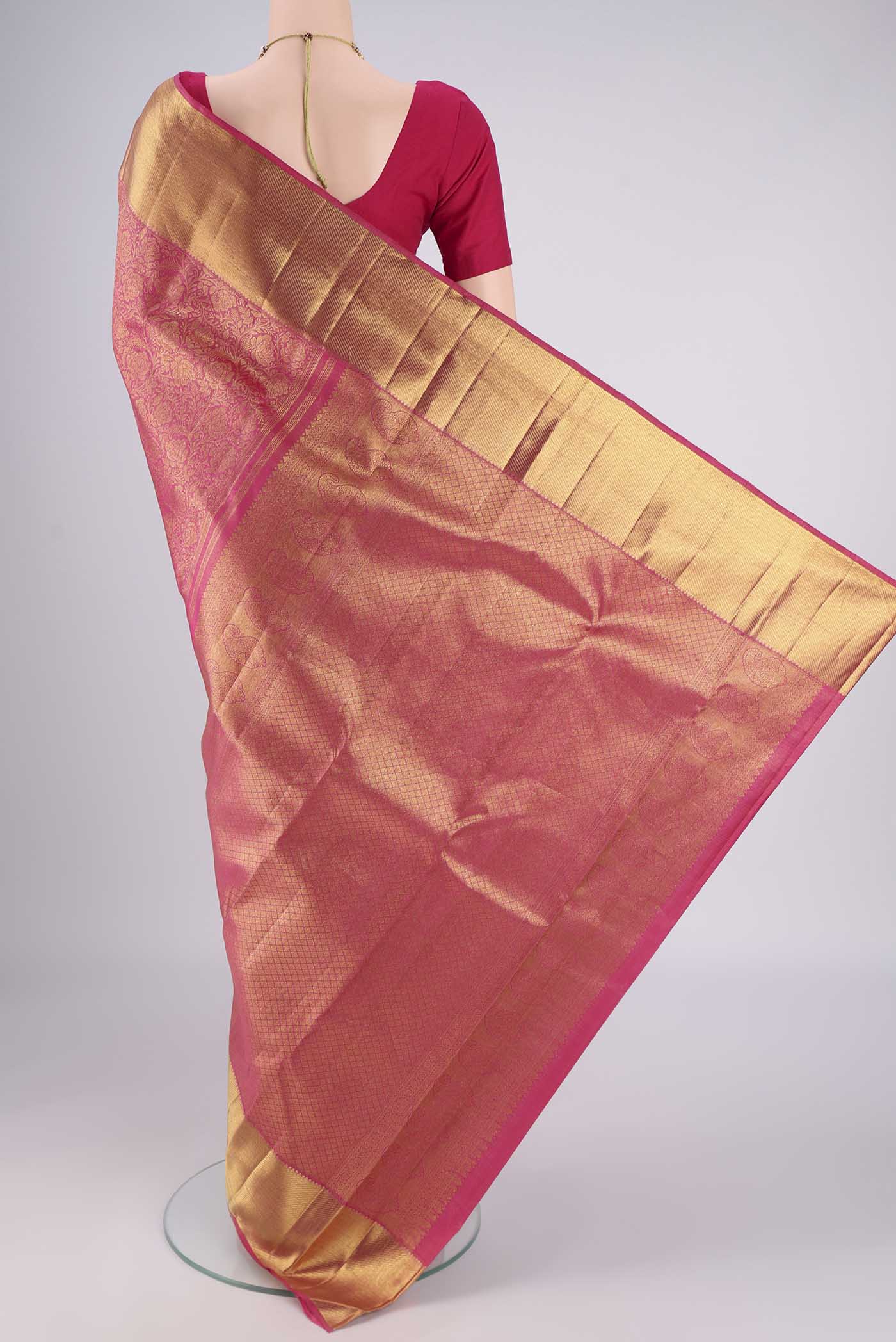 Flat view of Pure Silk Pure Zari Pink Kanjivaram Saree with Zari Brocade on the body and Zari Border. 