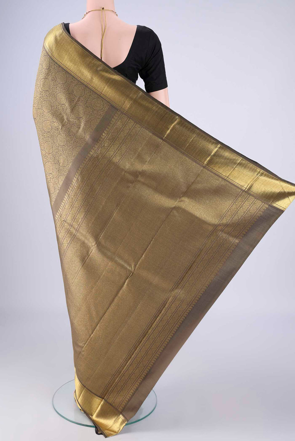 Flat view of Pure Silk Pure Zari Davys Grey Kanjivaram Saree with Zari Butta on the body and Zari Border. 