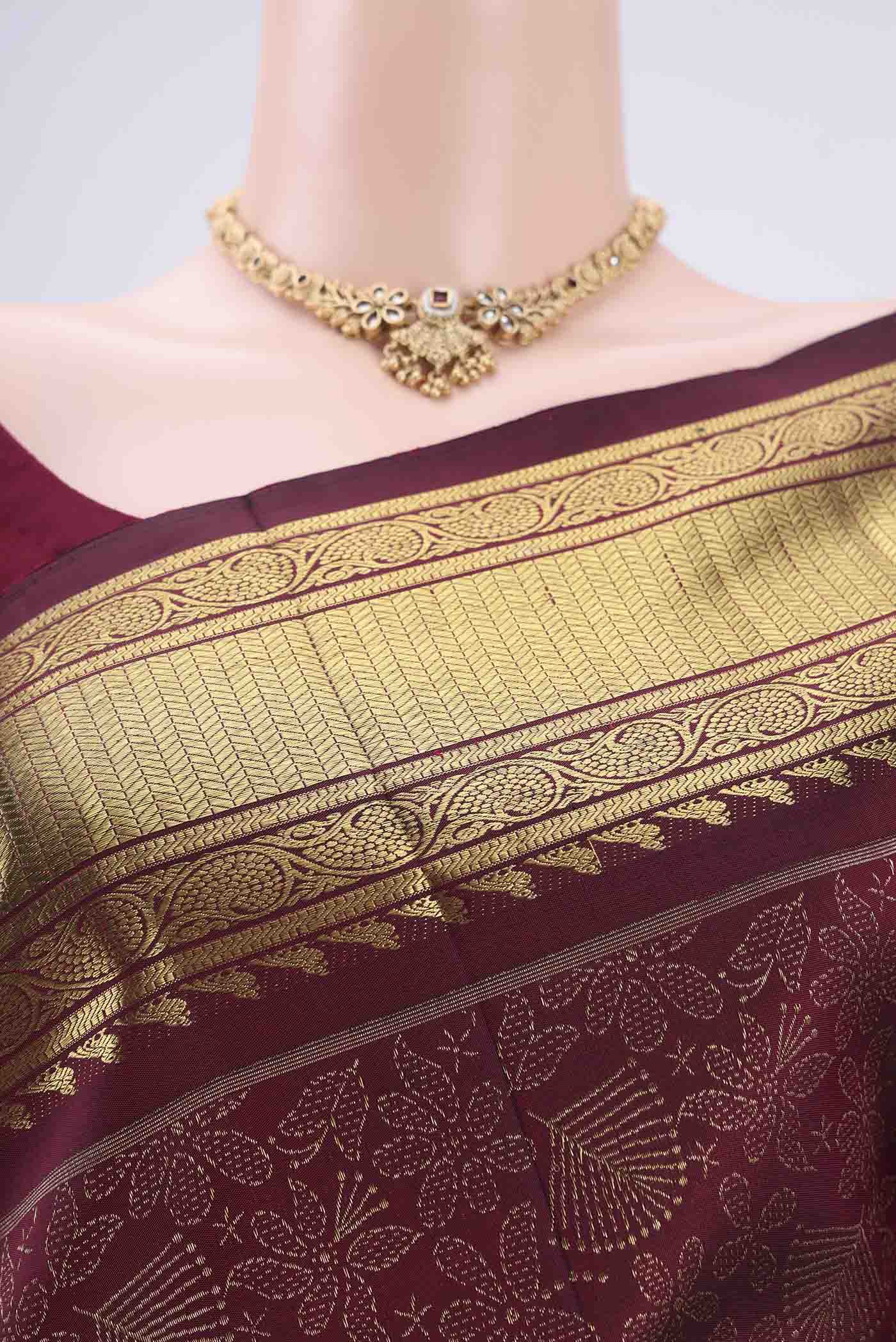 Border image of Pure Silk Pure Zari Brown Kanjivaram Saree with Zari Butta on the body and Zari Border. 