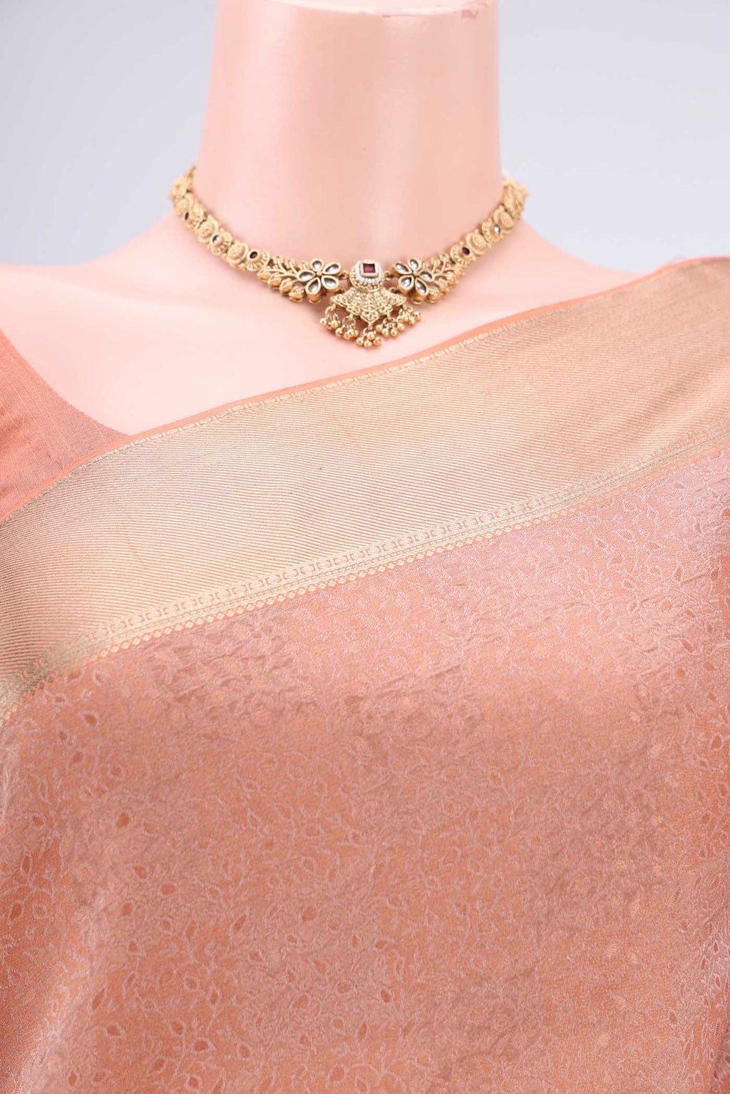 Border image of Golden Peach Mysore Georgette Saree with Jacquard design on the body and Zari Border. 