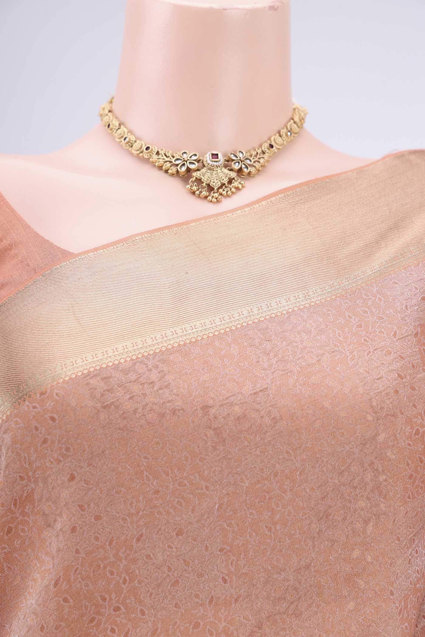 Border image of Golden Peach Mysore Georgette Saree with Jacquard design on the body and Zari Border. 