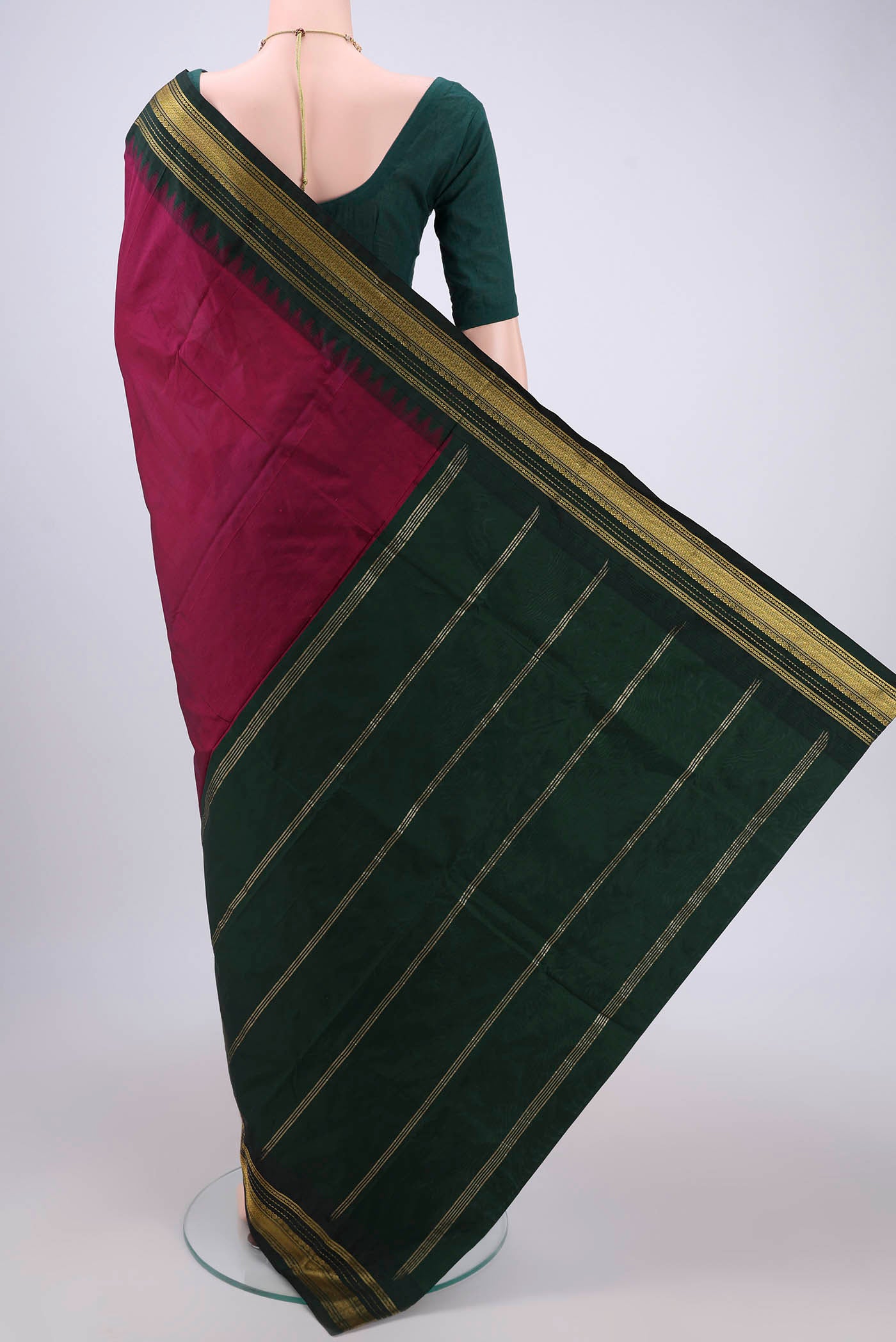 Flat view of Magenta Blended Bangalore Silk Saree with Plain Body and Temple Border. 