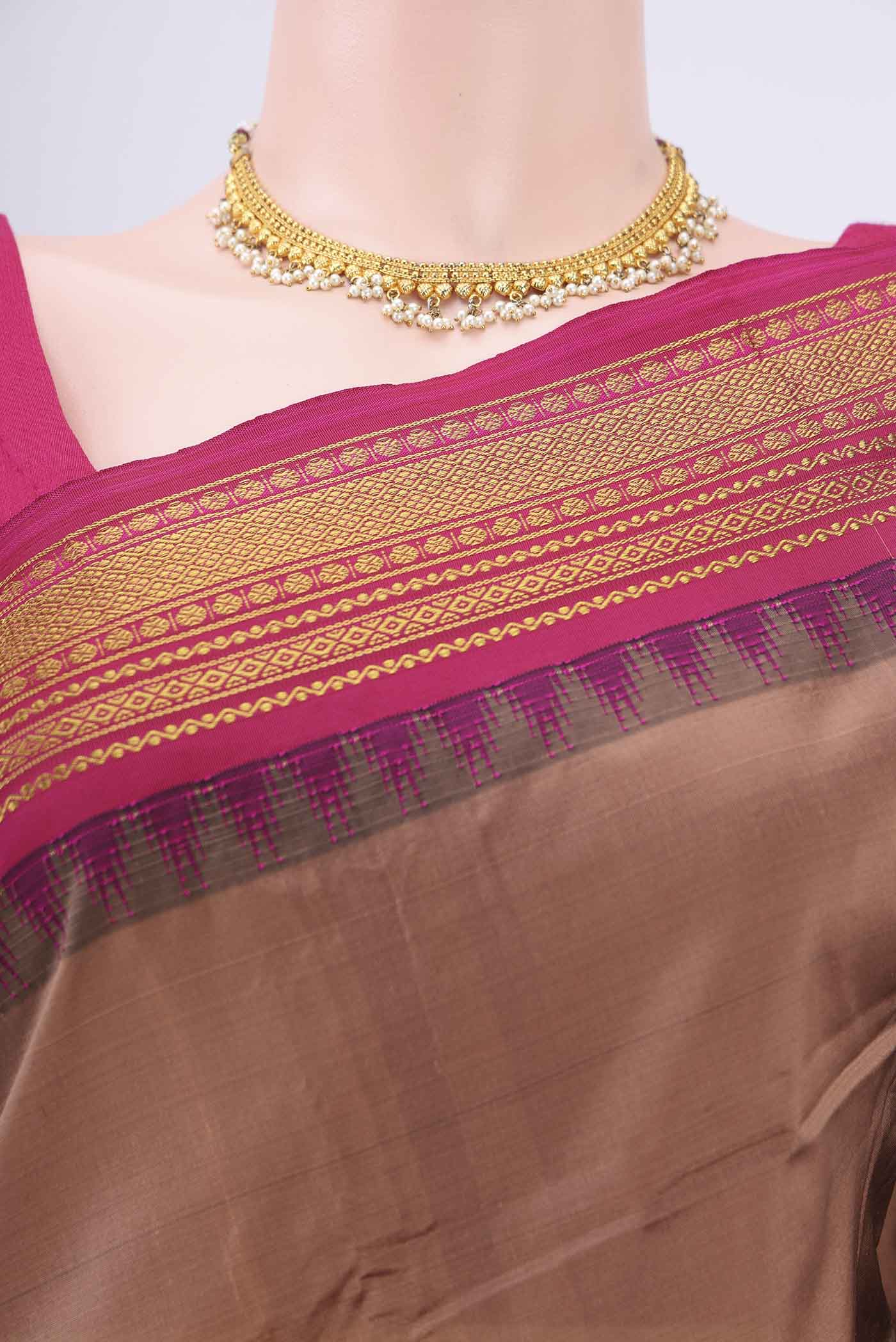 Border image of Coral Blended Bangalore Silk Saree with Plain Body and Temple Border. 