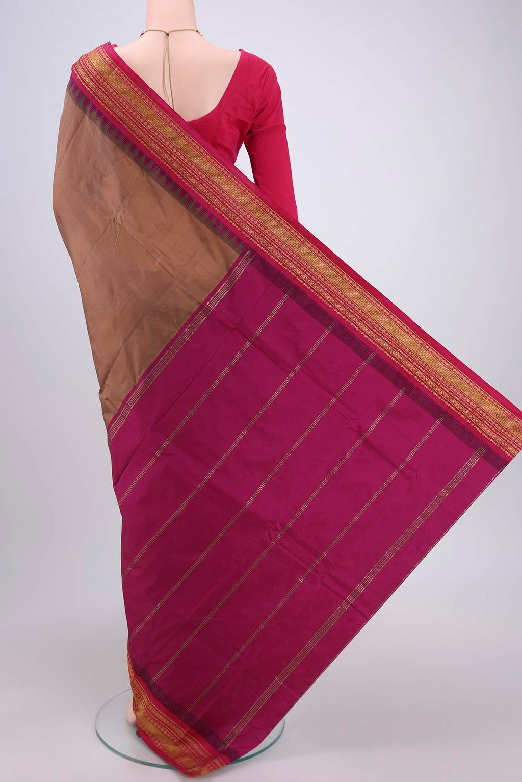 Flat view of Coral Blended Bangalore Silk Saree with Plain Body and Temple Border. 