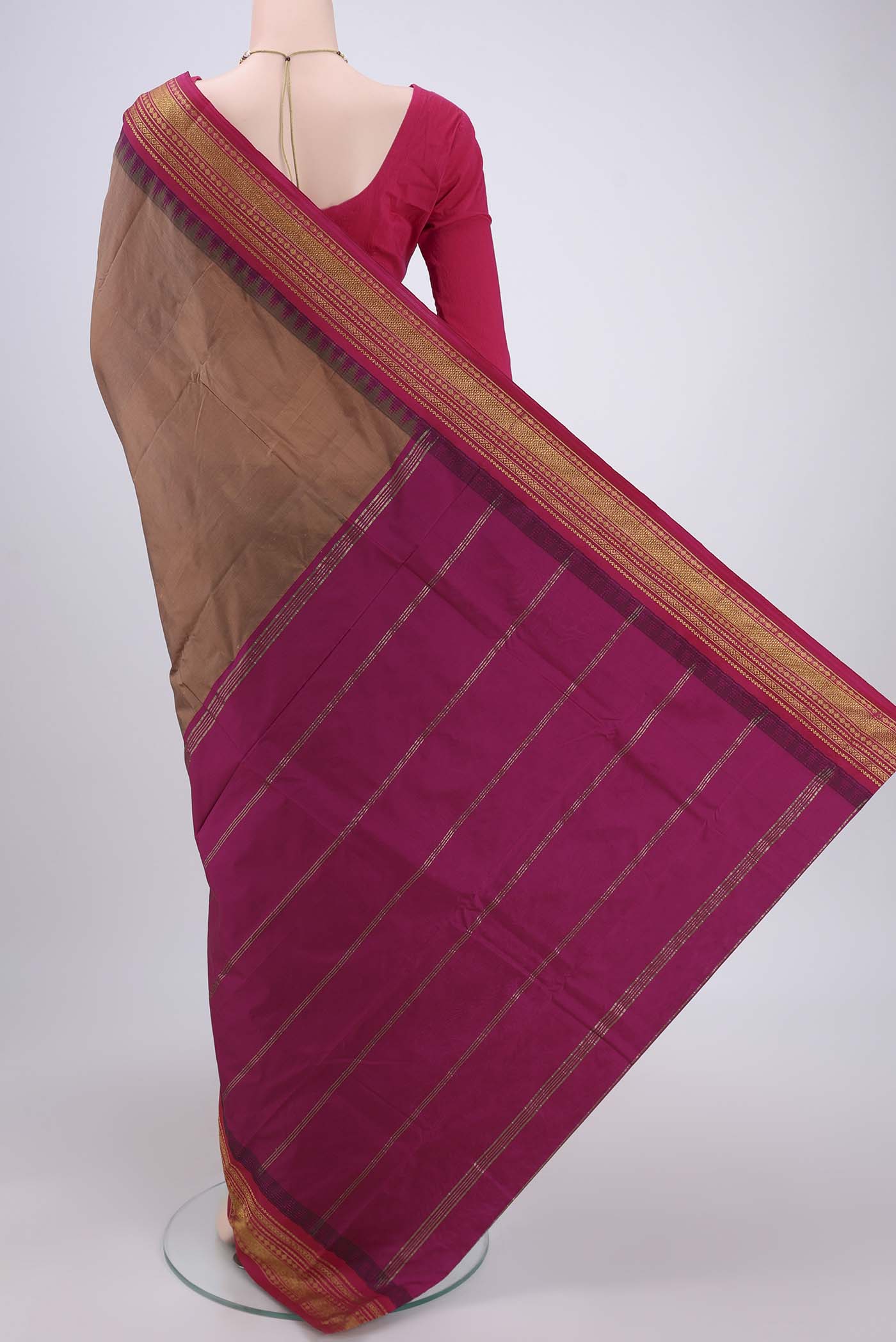 Flat view of Coral Blended Bangalore Silk Saree with Plain Body and Temple Border. 