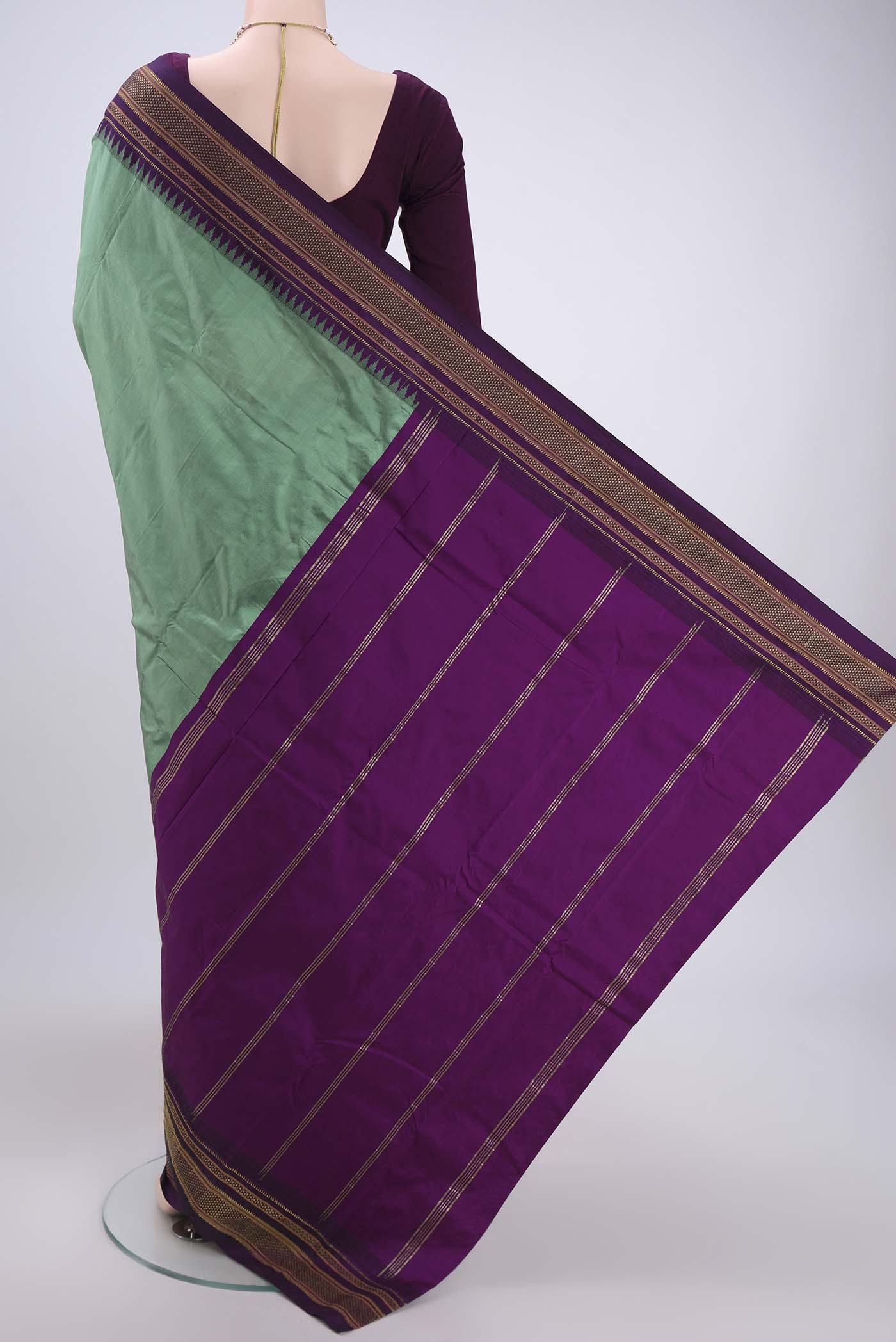 Flat view of Pista Green Blended Bangalore Silk Saree with Plain Body and Temple Border. 