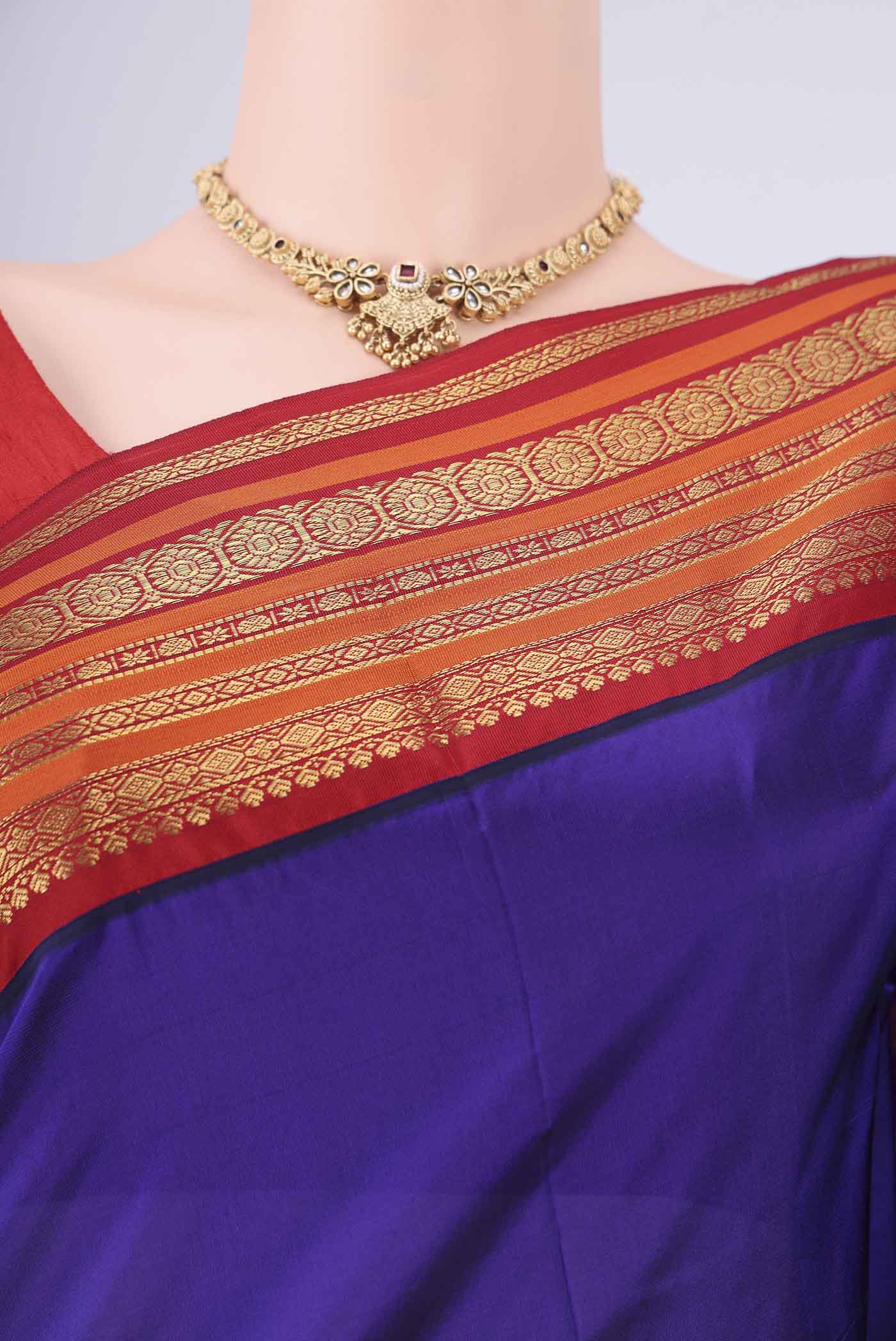 Border image of Purple Blended Bangalore Silk Saree with Zari Butta on the body and Zari Border. 