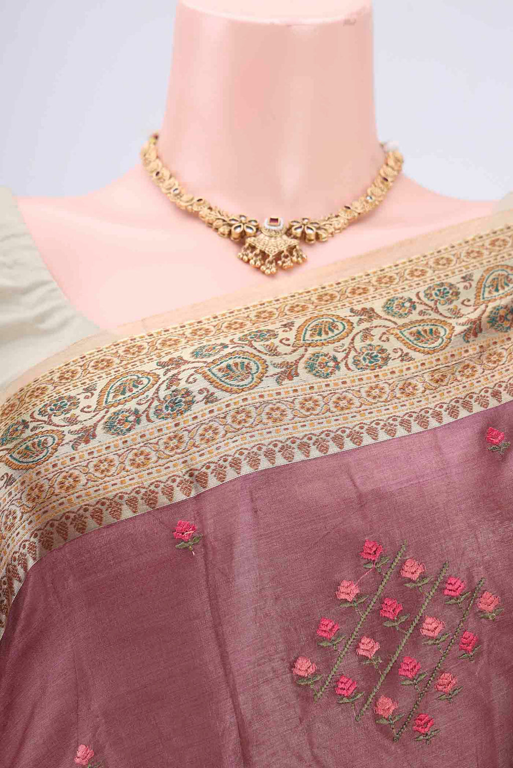 Border image of Mauve Banarasi Tussar Silk Saree with Embroidery on the body and Zari And Thread Border. 
