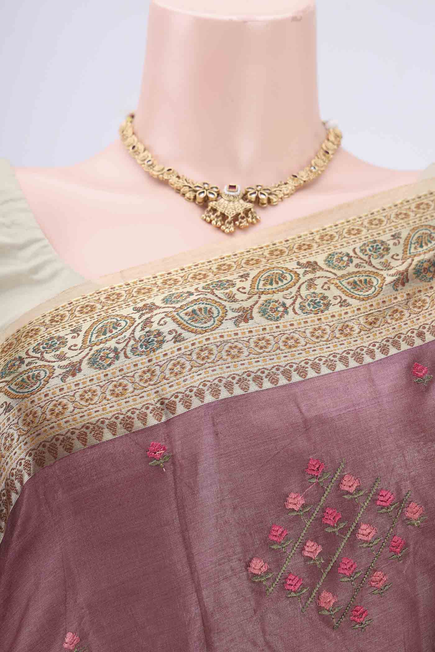 Border image of Mauve Banarasi Tussar Silk Saree with Embroidery on the body and Zari And Thread Border. 