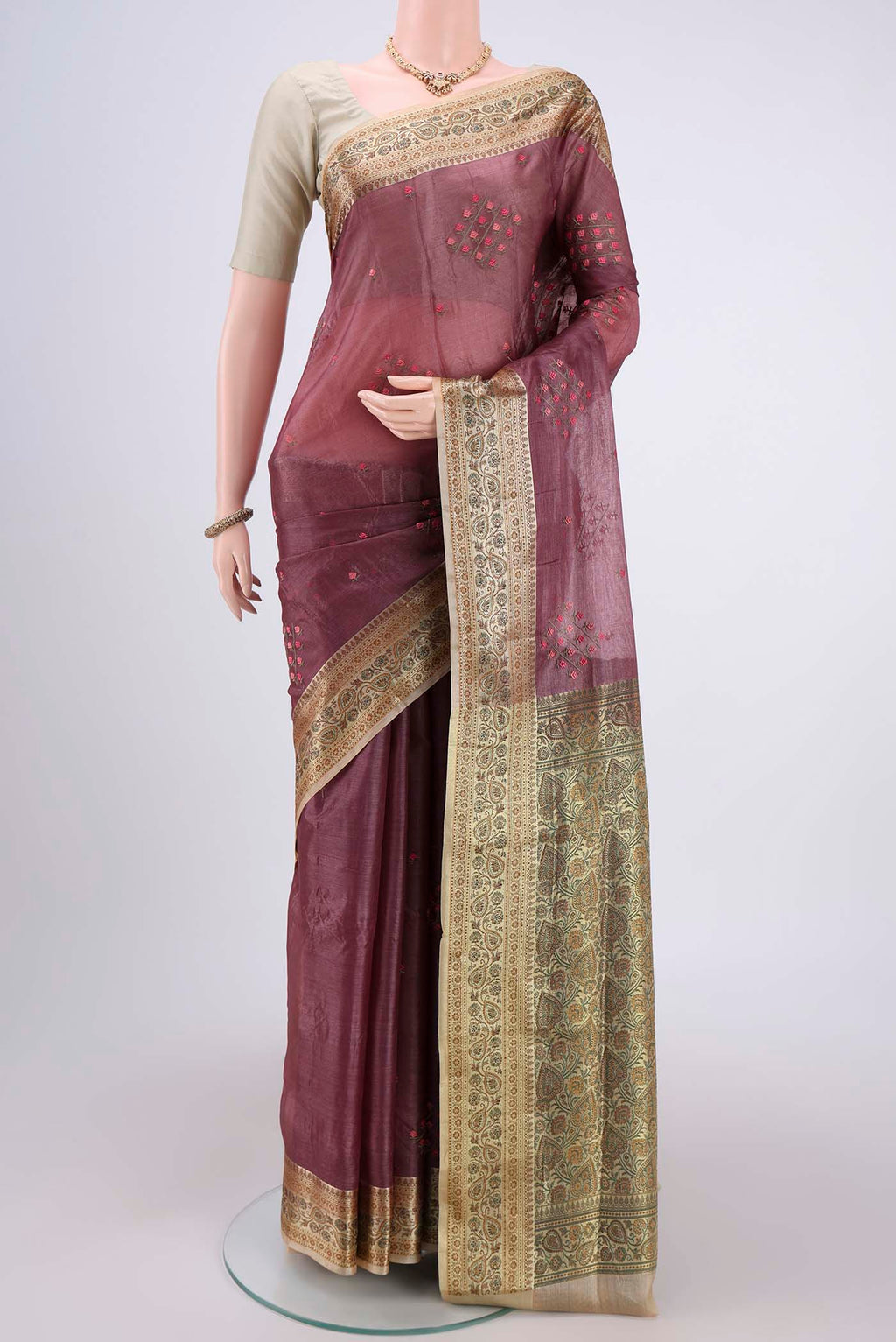 Mauve Banarasi Tussar Silk Saree with Embroidery on the body and Zari And Thread Border.  displayed on a mannequin