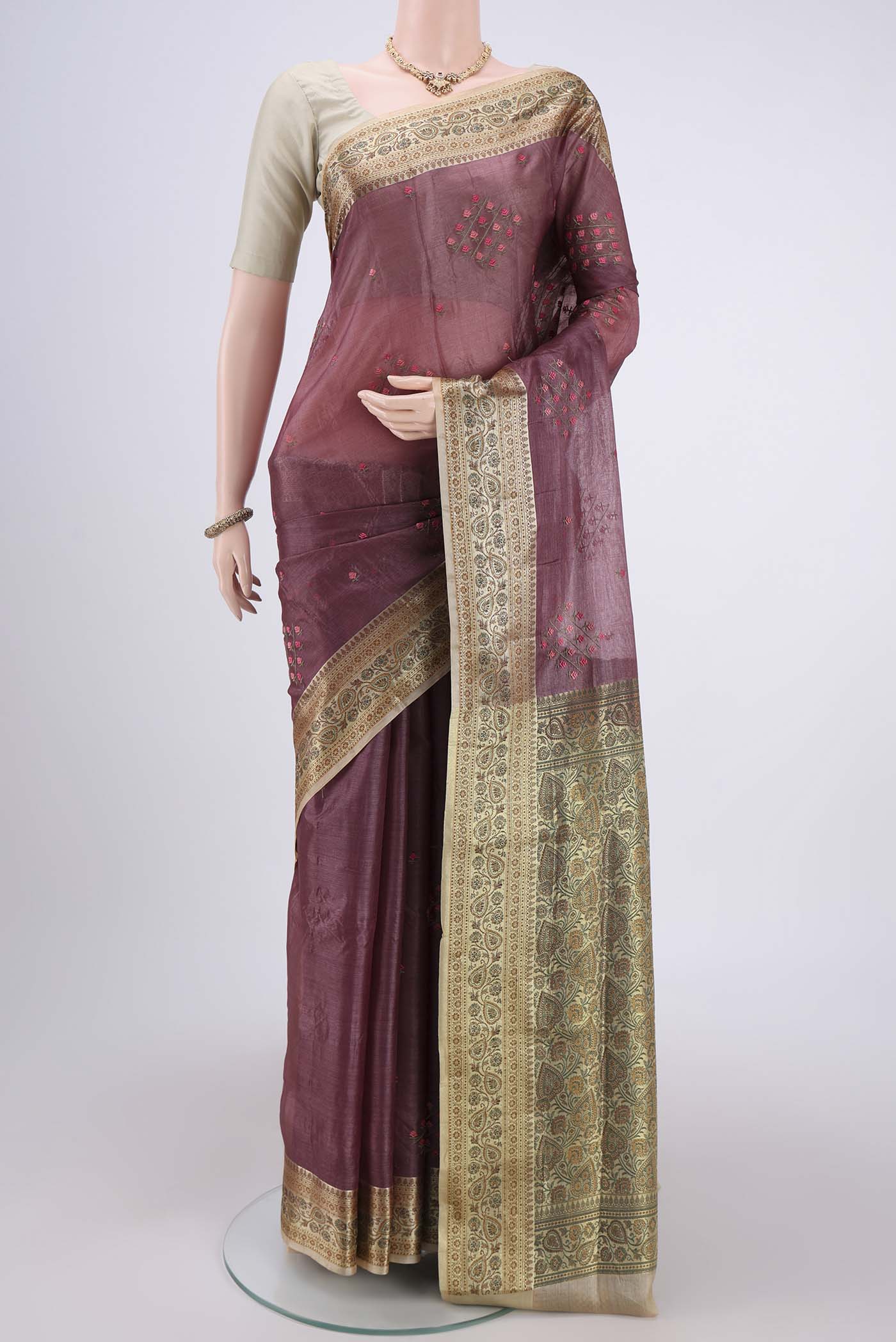 Mauve Banarasi Tussar Silk Saree with Embroidery on the body and Zari And Thread Border.  displayed on a mannequin