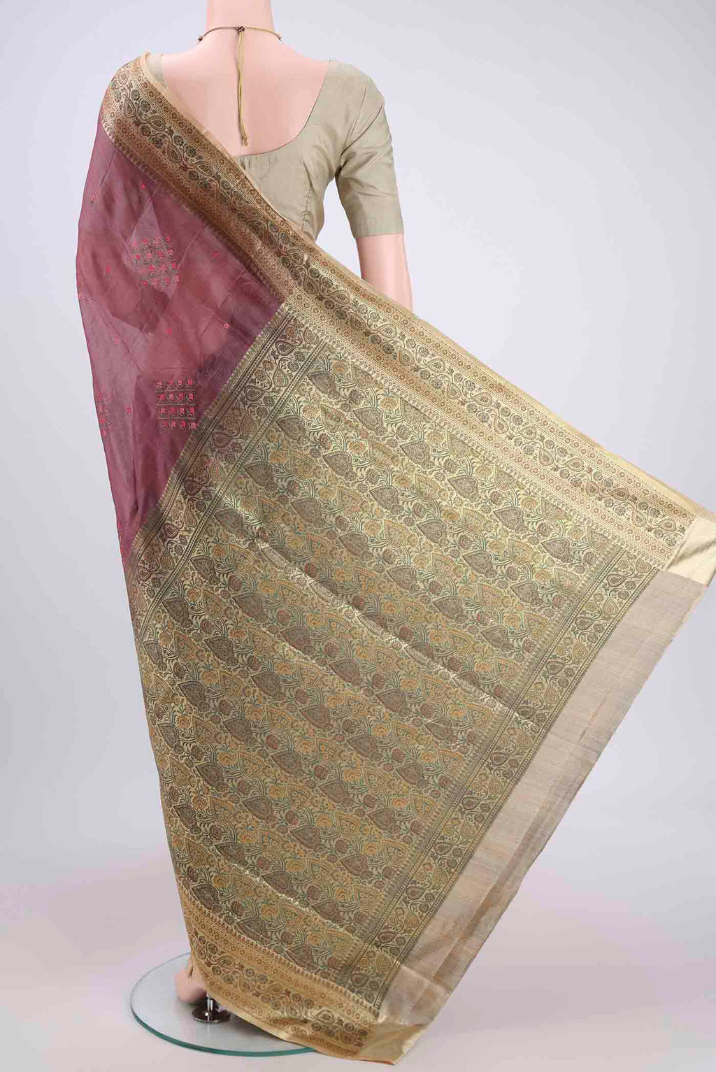 Flat view of Mauve Banarasi Tussar Silk Saree with Embroidery on the body and Zari And Thread Border. 
