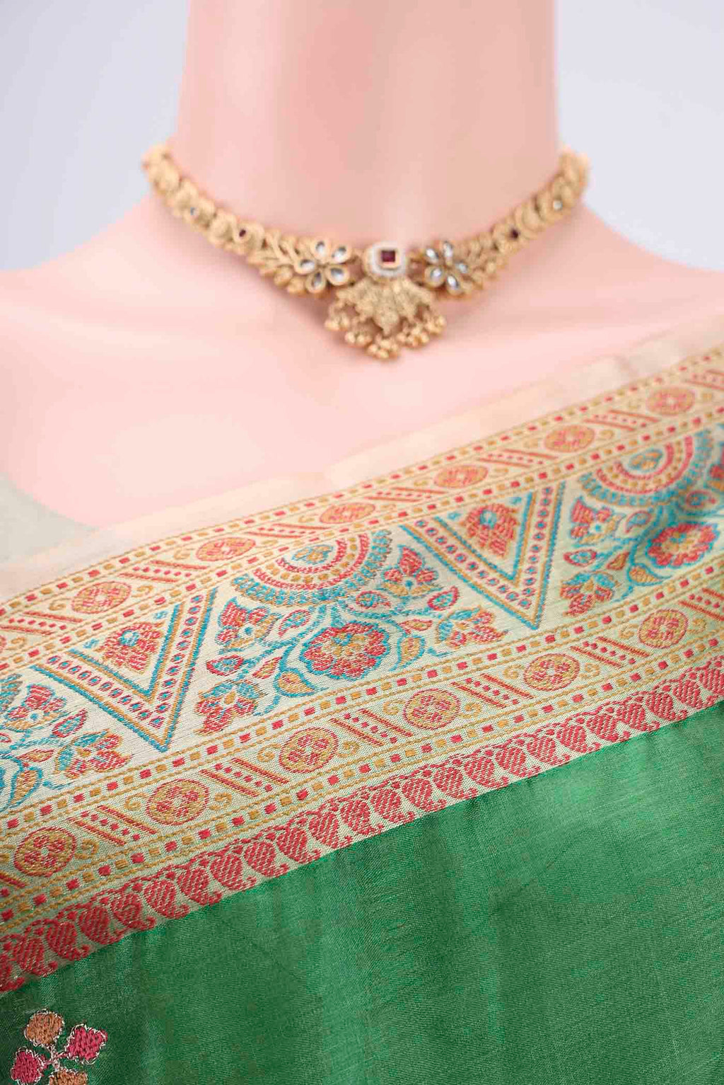 Border image of Green Banarasi Tussar Silk Saree with Embroidery on the body and Zari And Thread Border. 