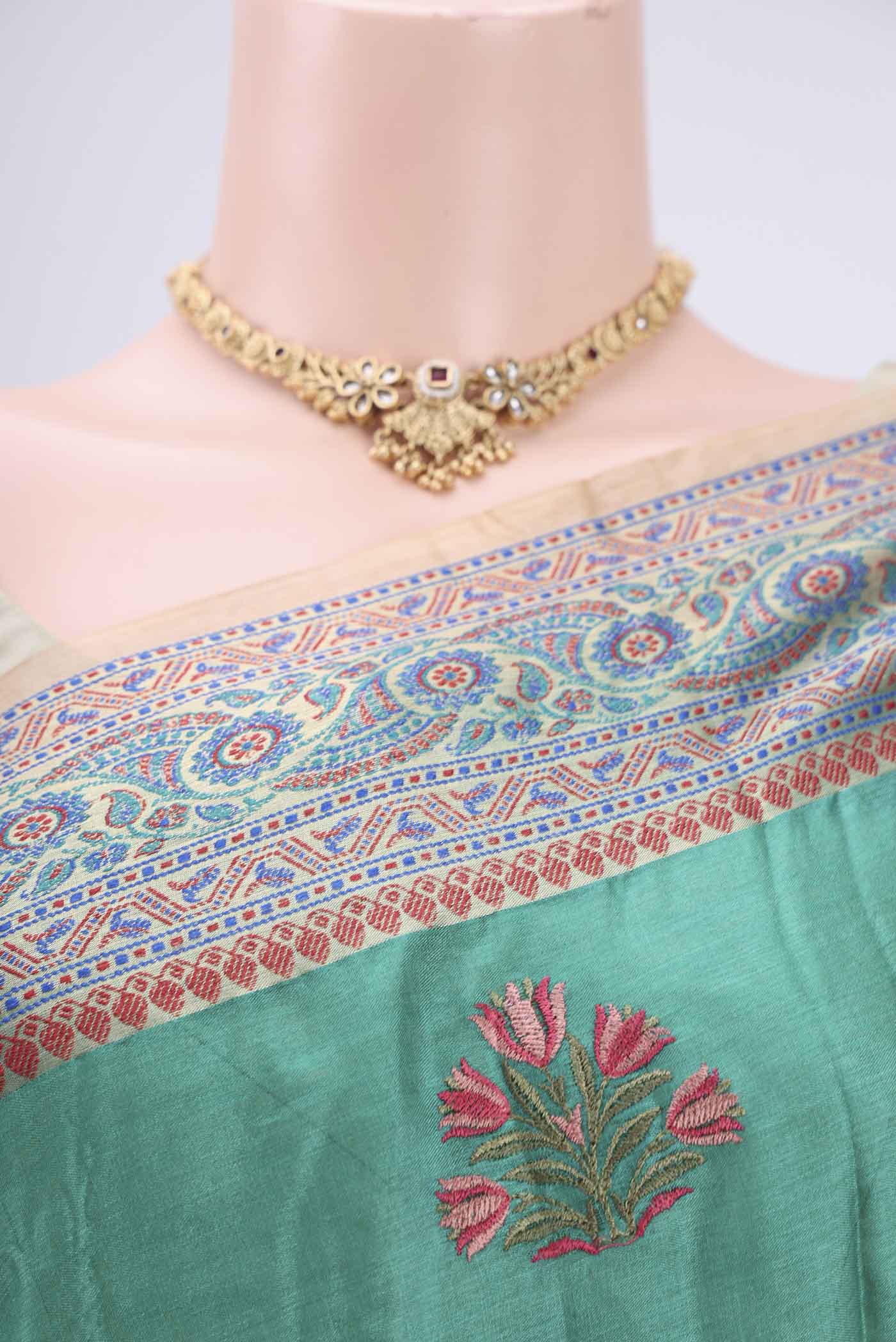 Border image of Sea Green Dual Tone Maheshwari Silk Cotton Saree with Stripes on the body and Zari Border. 