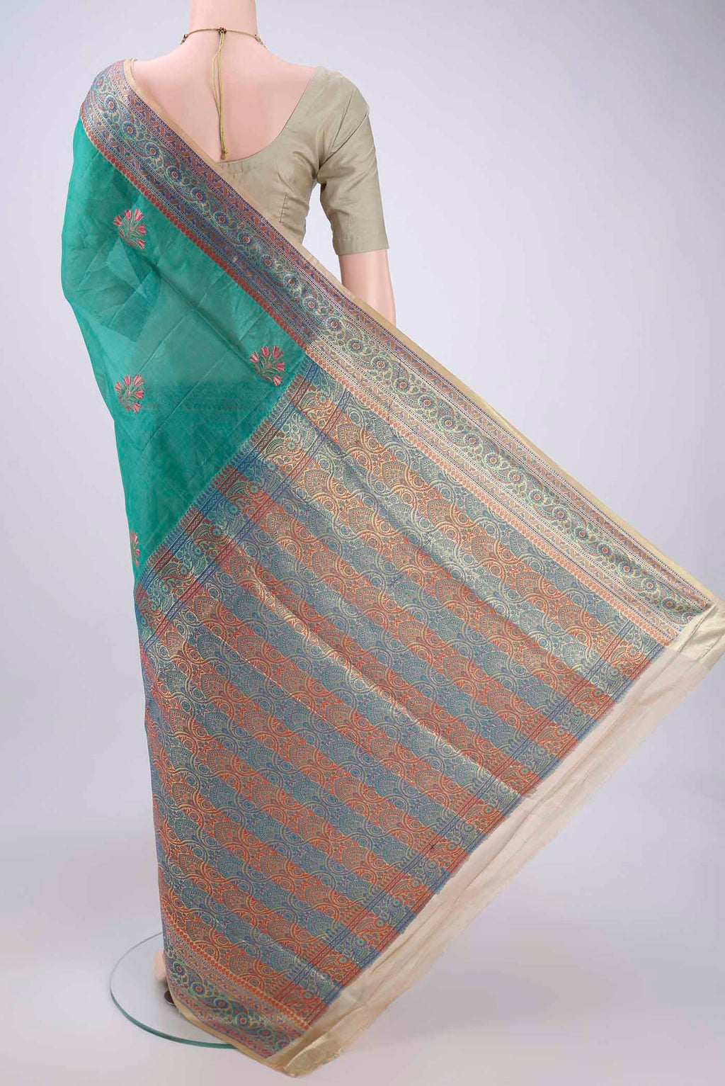 Flat view of Sea Green Dual Tone Maheshwari Silk Cotton Saree with Stripes on the body and Zari Border. 