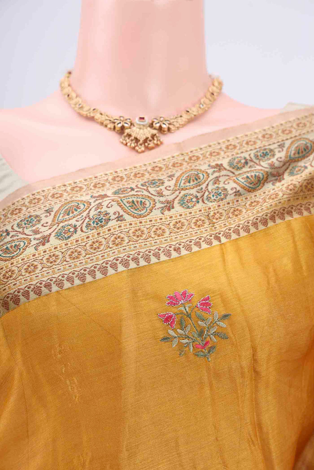 Border image of Yellow Banarasi Tussar Silk Saree with Embroidery on the body and Zari And Thread Border. 