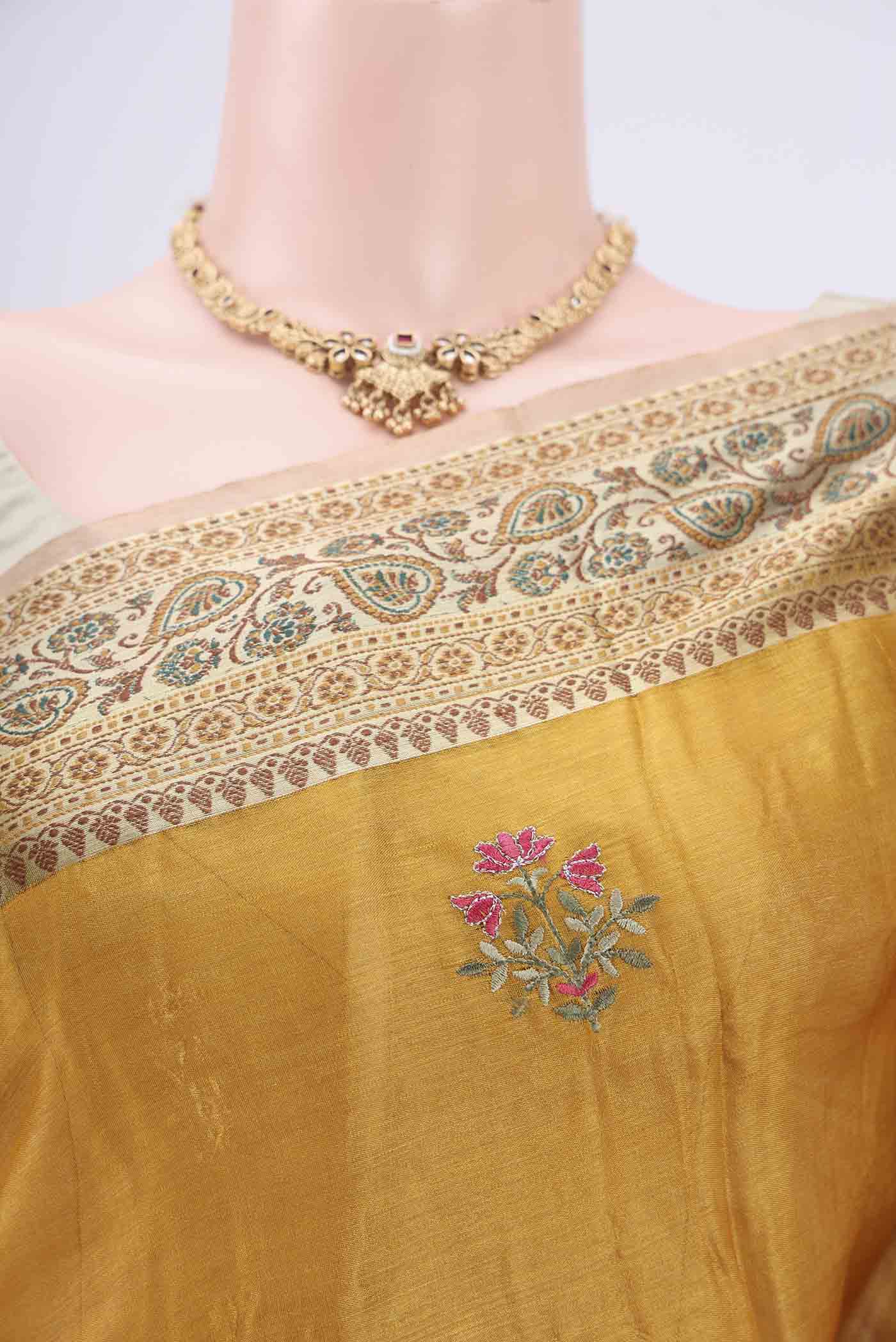 Border image of Yellow Banarasi Tussar Silk Saree with Embroidery on the body and Zari And Thread Border. 