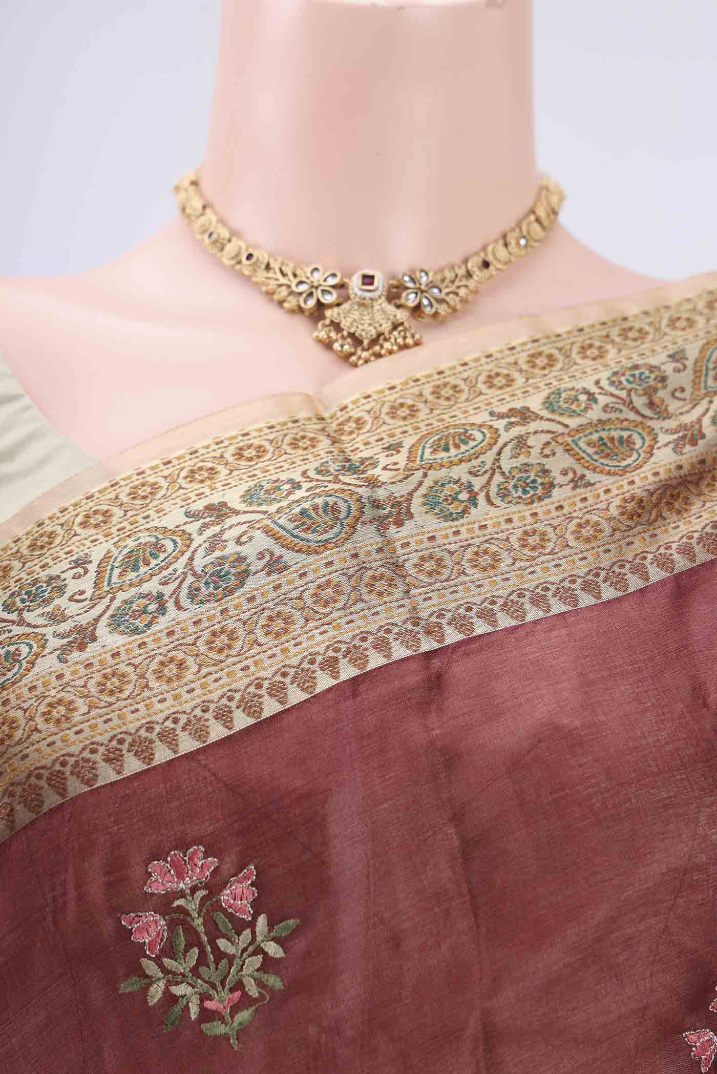 Border image of Brown Banarasi Tussar Silk Saree with Embroidery on the body and Zari And Thread Border. 