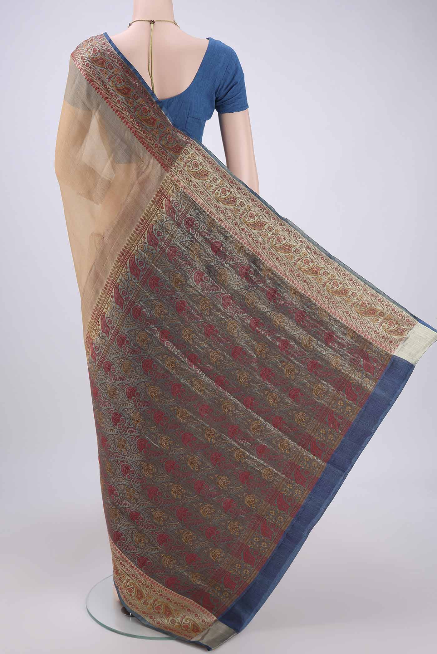 Flat view of Beige Dual Tone Maheshwari Silk Cotton Saree with Plain Body and Zari Border. 