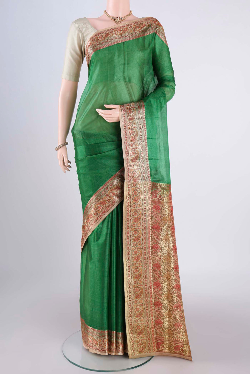 Green Dual Tone Maheshwari Silk Cotton Saree with Plain Body and Zari Border.  displayed on a mannequin