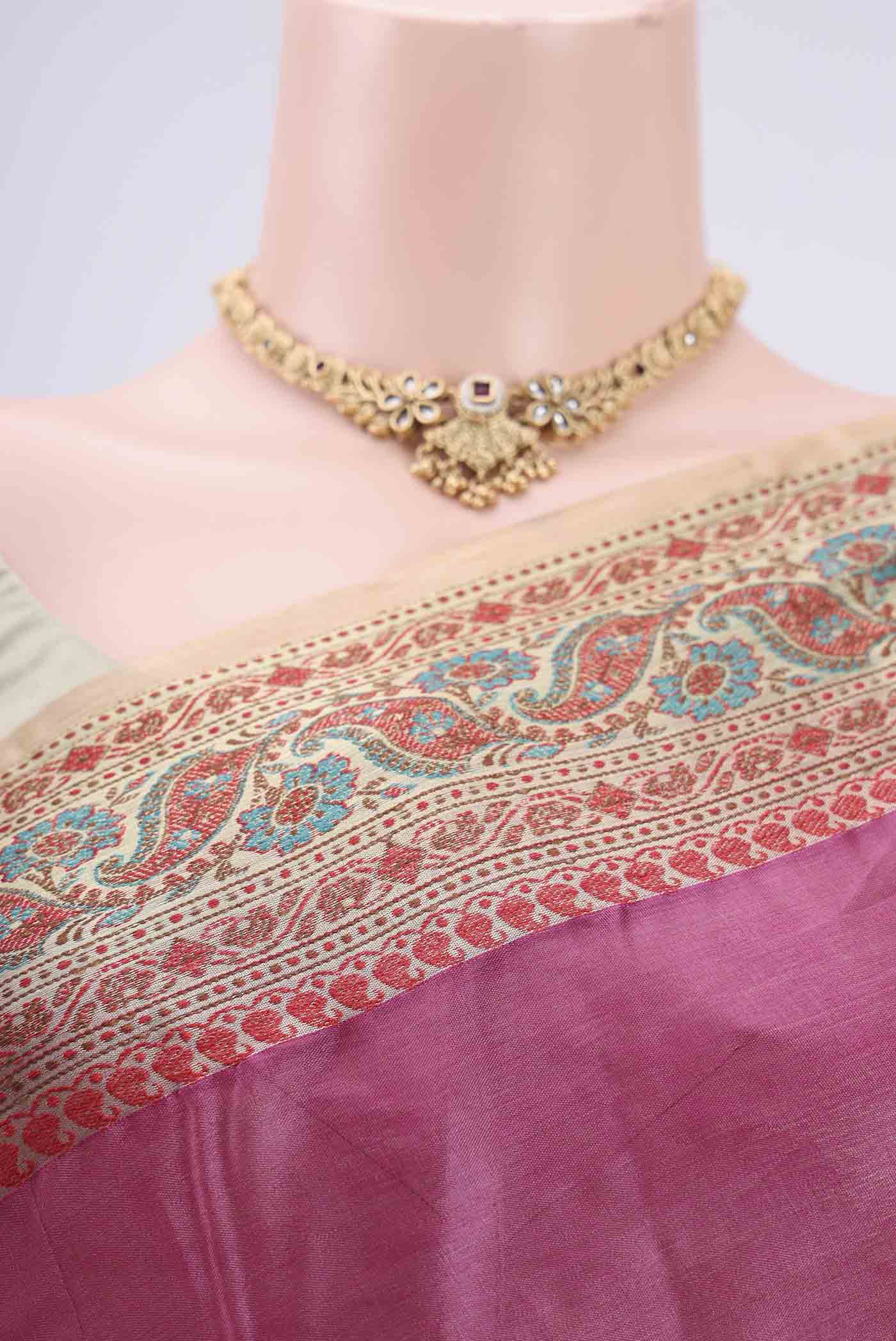 Border image of Rani Pink Dual Tone Maheshwari Silk Cotton Saree with Plain Body and Zari Border. 