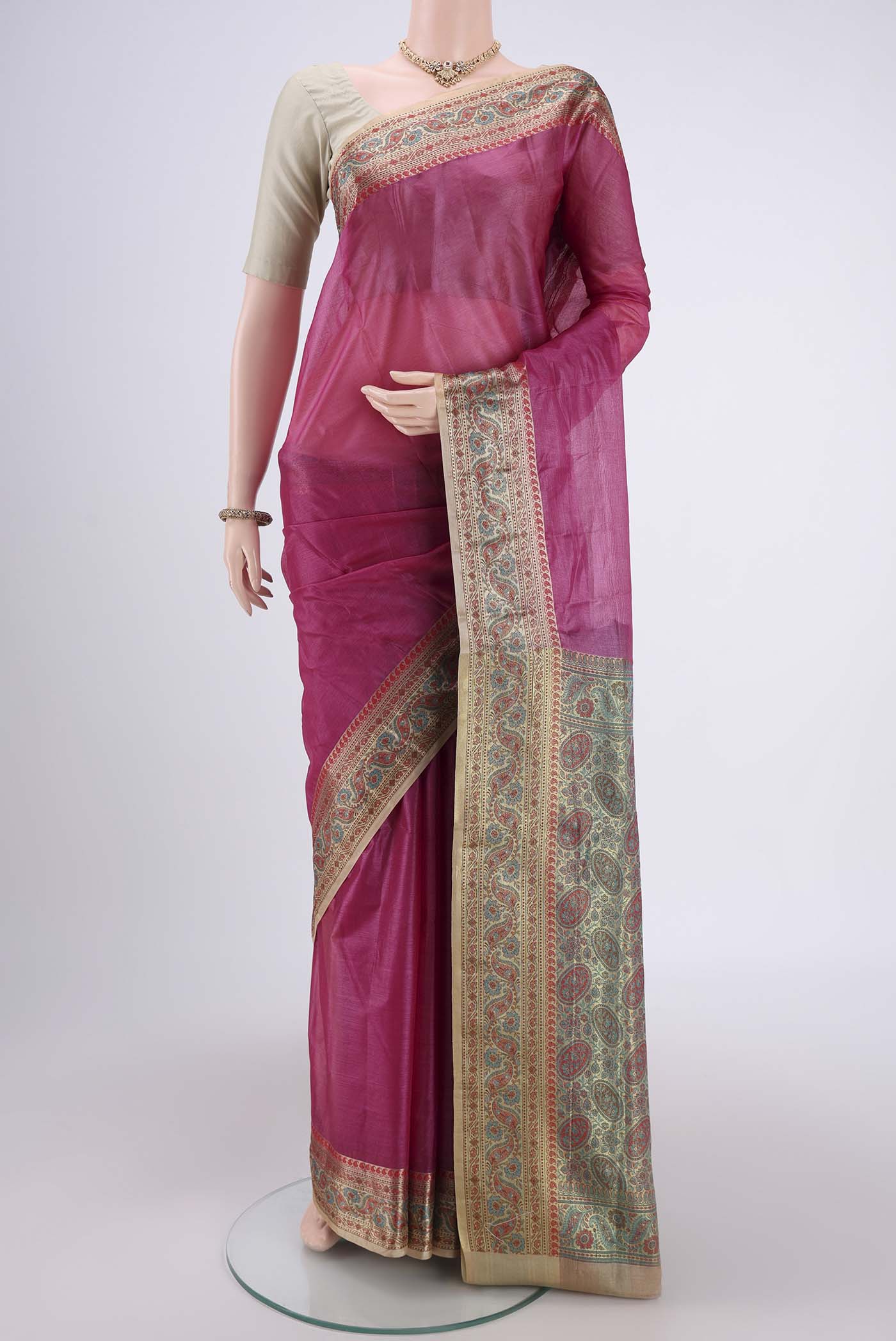 Rani Pink Dual Tone Maheshwari Silk Cotton Saree with Plain Body and Zari Border.  displayed on a mannequin