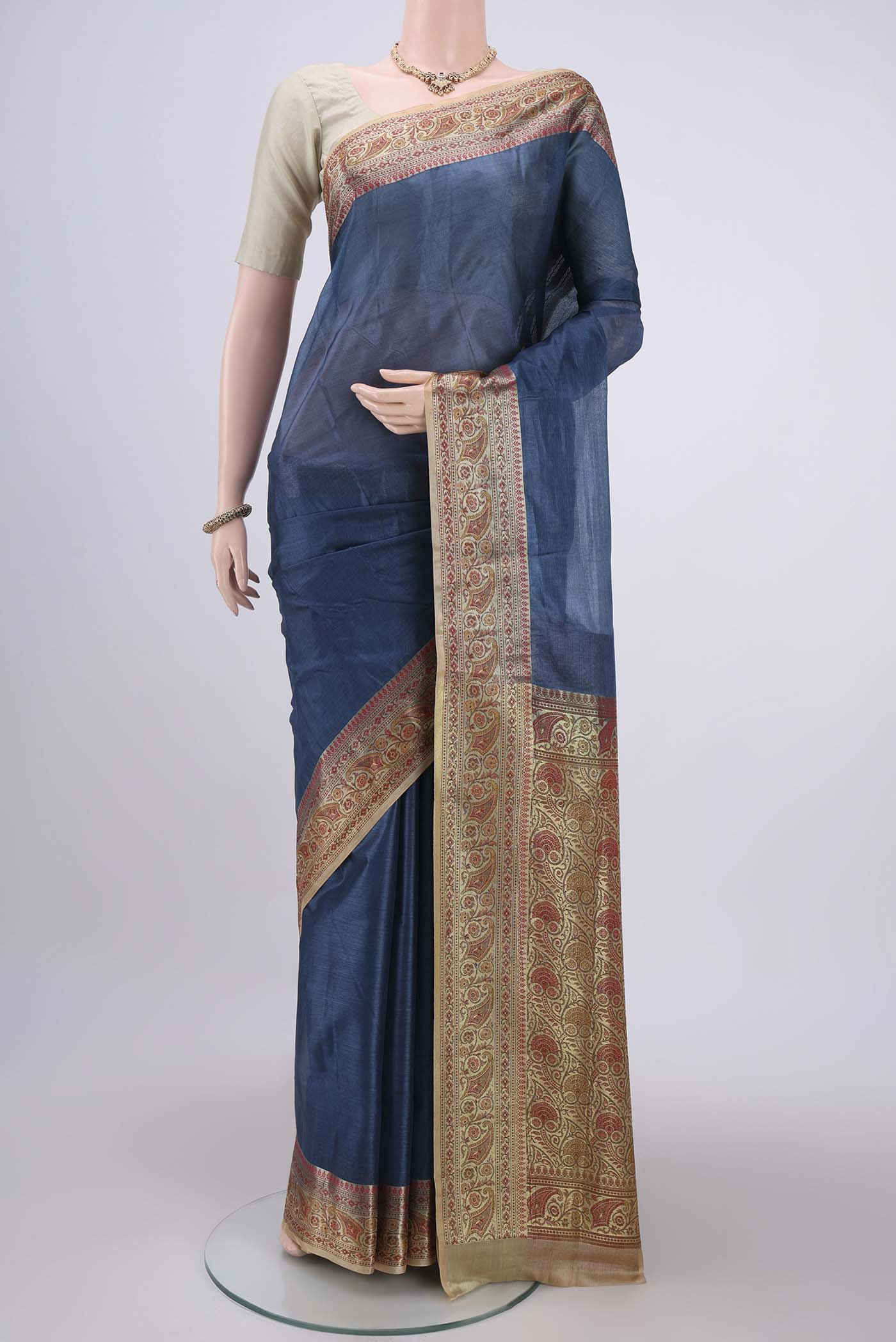 Blue Dual Tone Maheshwari Silk Cotton Saree with Plain Body and Zari Border.  displayed on a mannequin