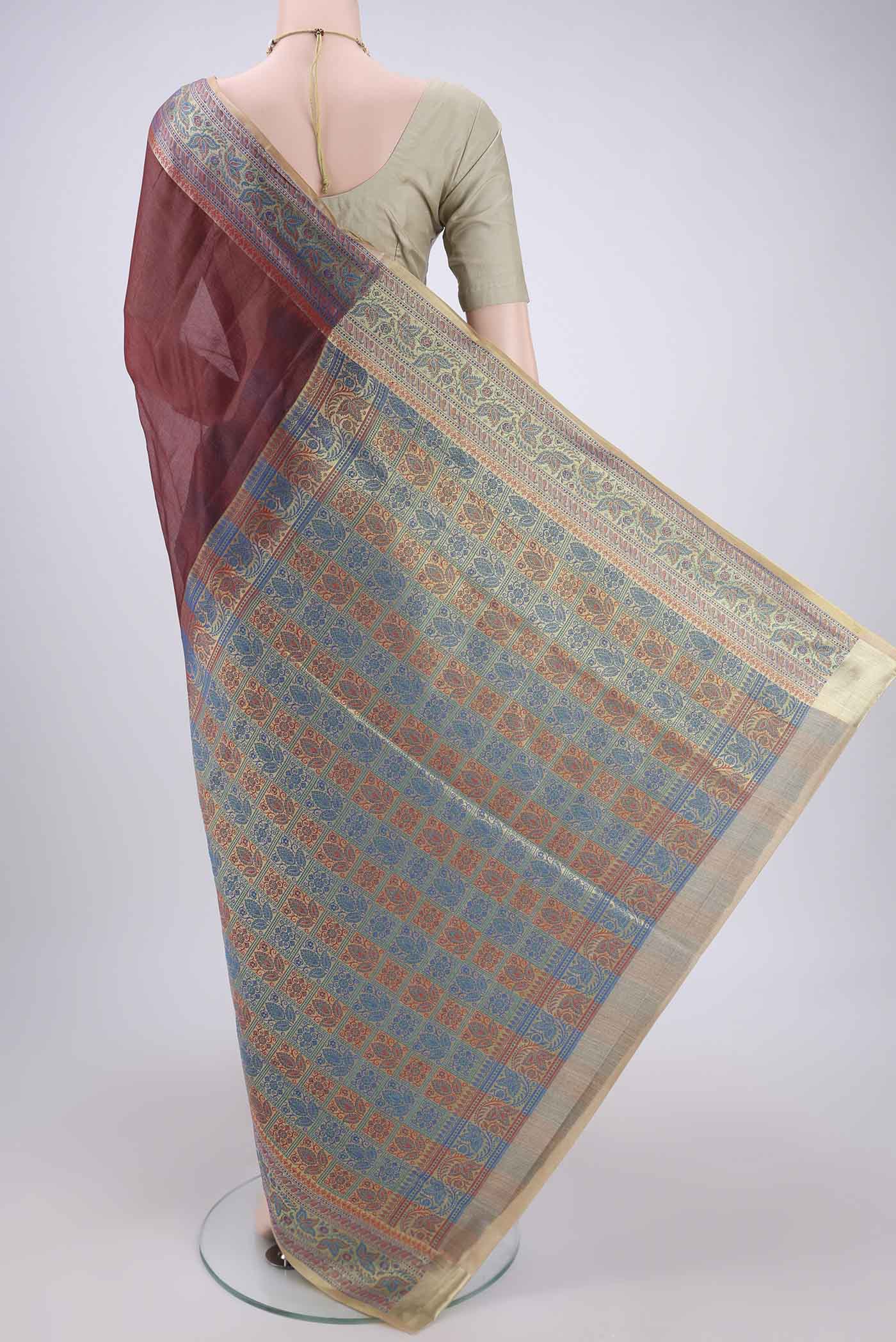Flat view of Brown Dual Tone Maheshwari Silk Cotton Saree with Plain Body and Zari Border. 