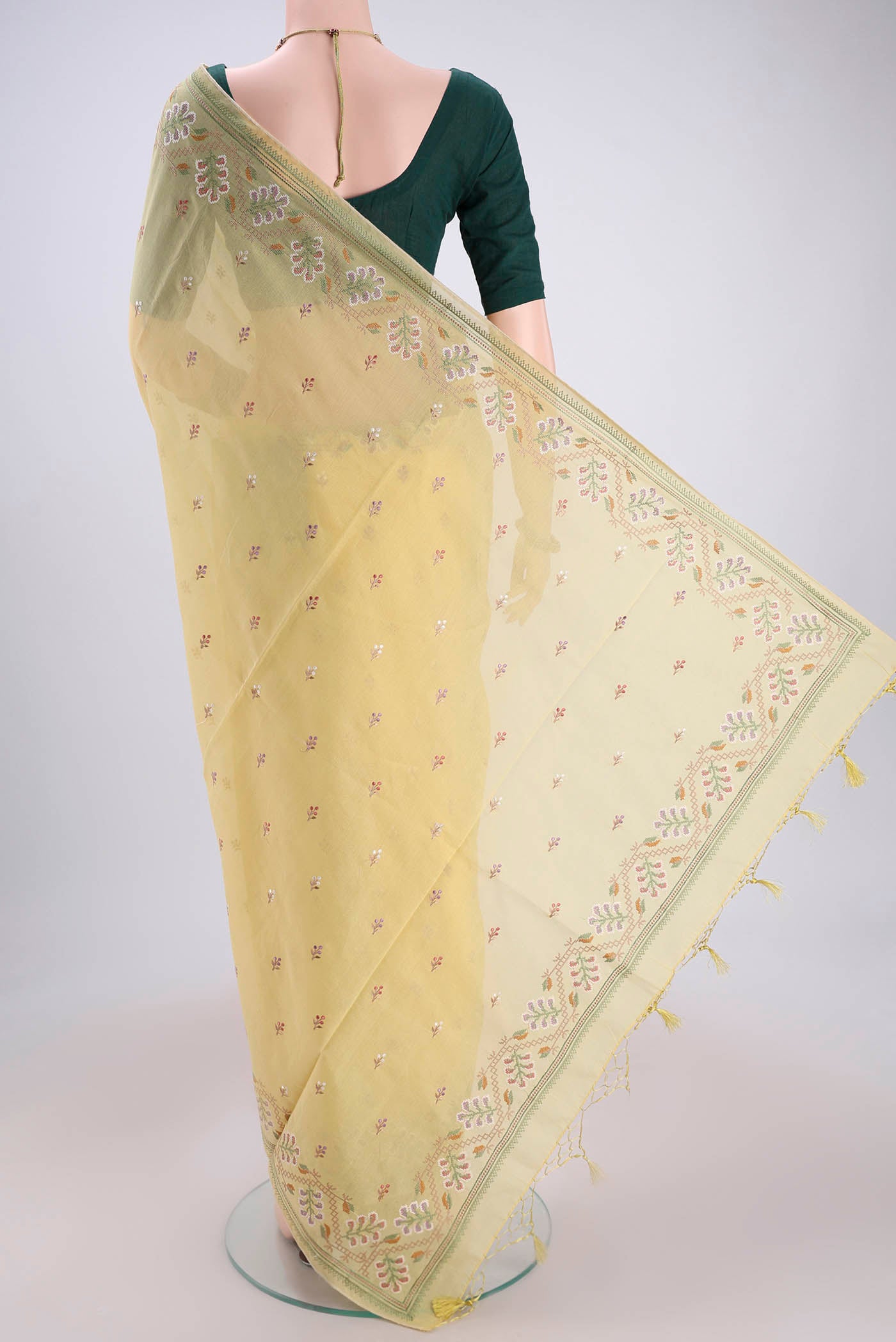 Flat view of Yellow Kota Cotton Saree with Embroidery on the body and Thread Border. 
