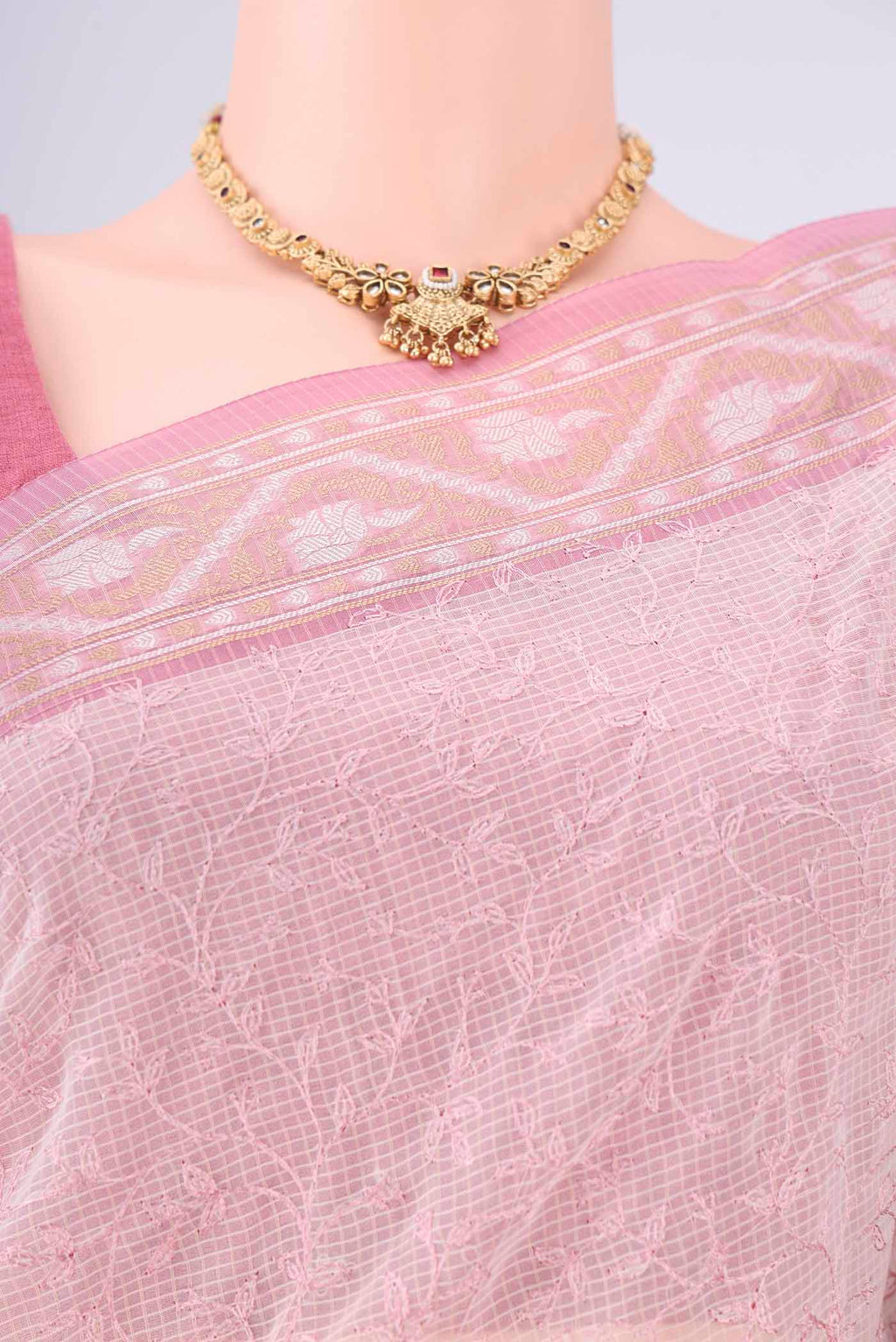 Border image of White Blended Kota Cotton Saree with Embroidery on the body and Zari Border. 