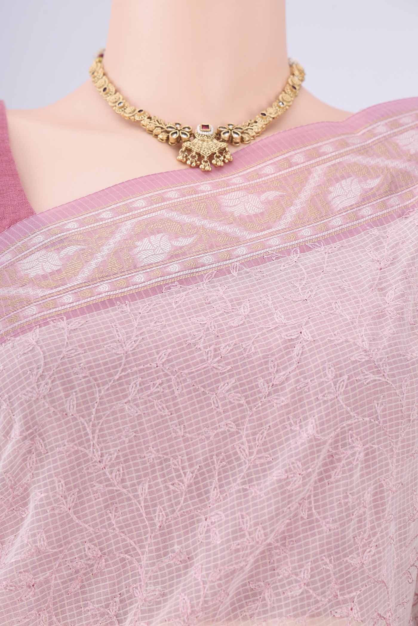 Border image of White Blended Kota Cotton Saree with Embroidery on the body and Zari Border. 