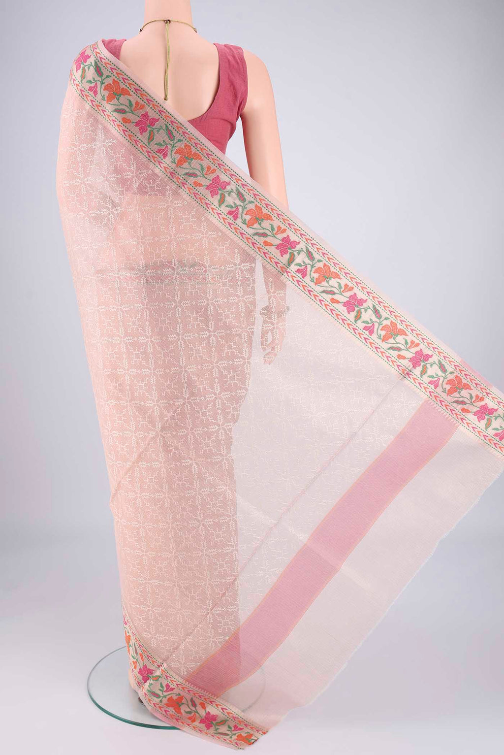 Flat view of Rose pink Blended Kota Cotton Saree with Embroidery on the body and Zari And Thread Border. 