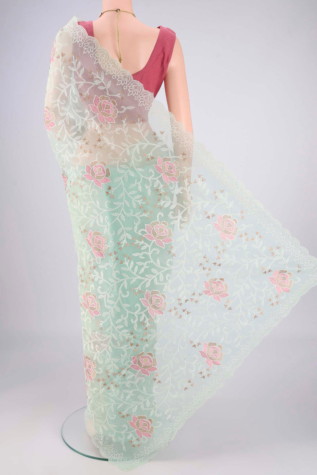 Flat view of Mint Green Blended Kota Cotton Saree with Embroidery on the body and Thread Border. 