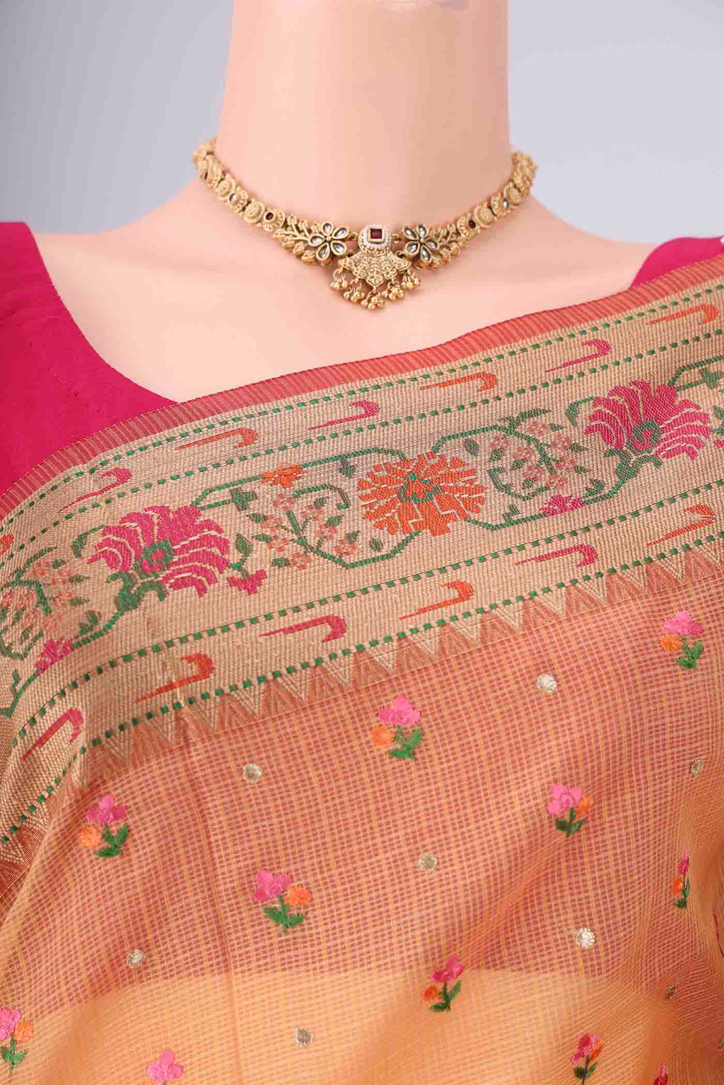 Border image of Orange Blended Kota Cotton Saree with Embroidery on the body and Zari Border. 