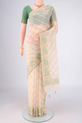 Cream Blended Kota Cotton Saree with Stripes on the body and Embroidery Border.  displayed on a mannequin