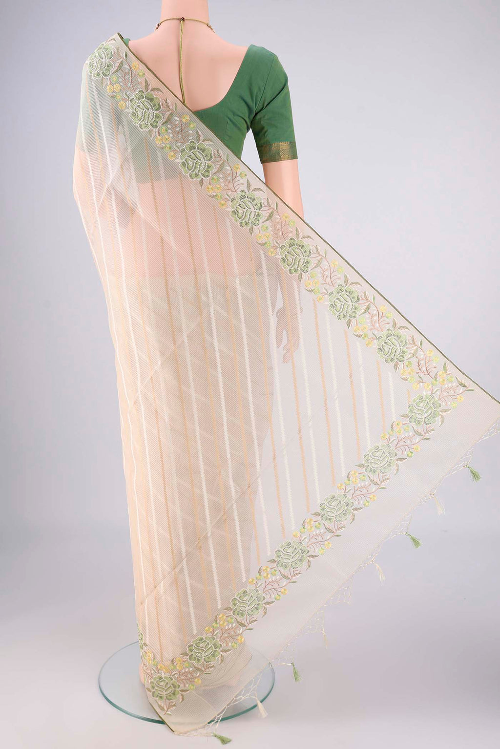 Flat view of Cream Blended Kota Cotton Saree with Stripes on the body and Embroidery Border. 