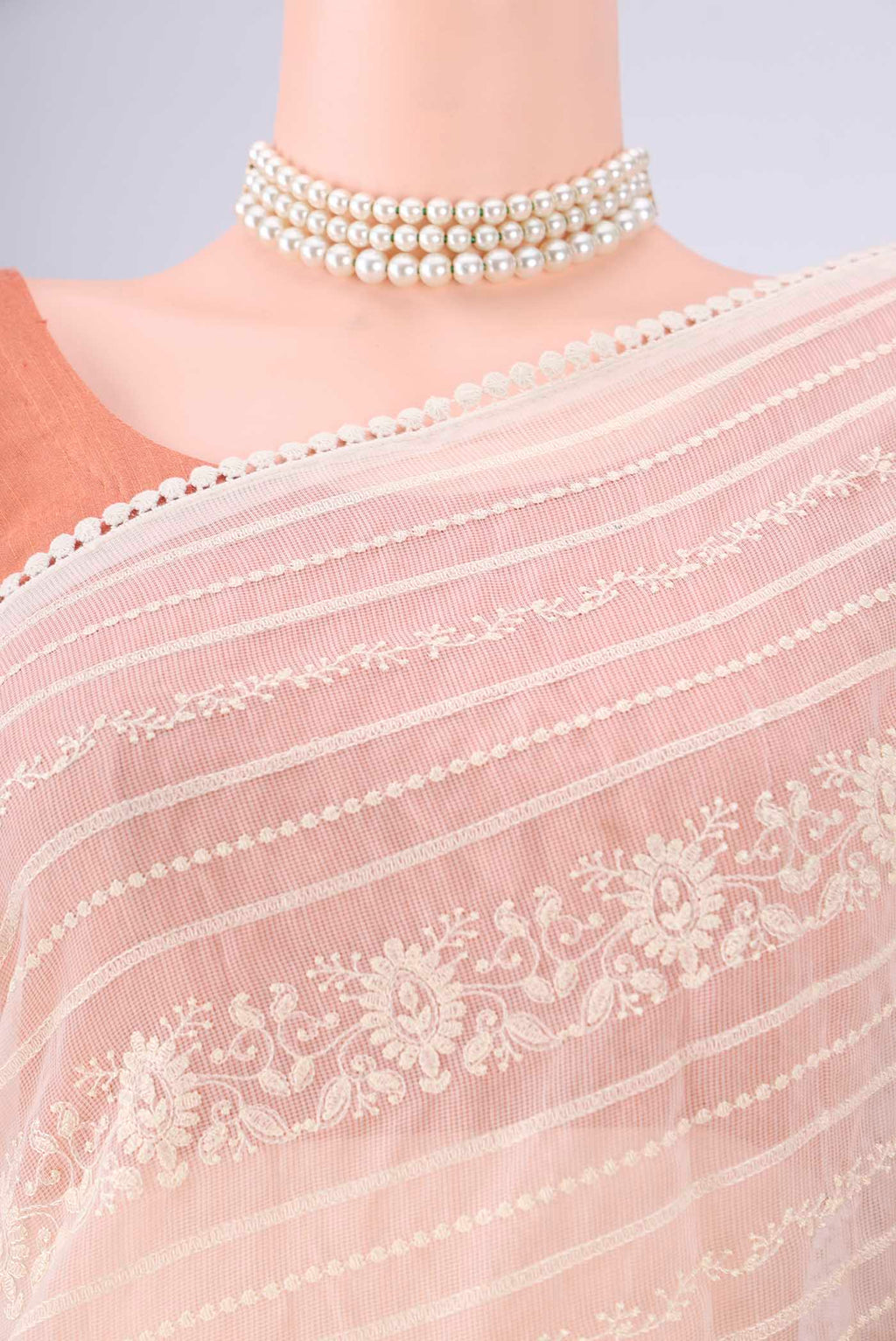 Border image of Off White Blended Kota Cotton Saree with Printed design on the body and Embroidery Border. 