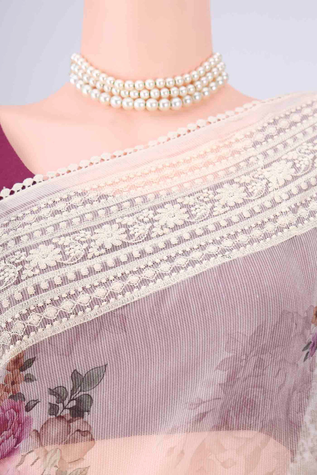 Border image of Off White Blended Kota Cotton Saree with Embroidery on the body and Embroidery Border. 