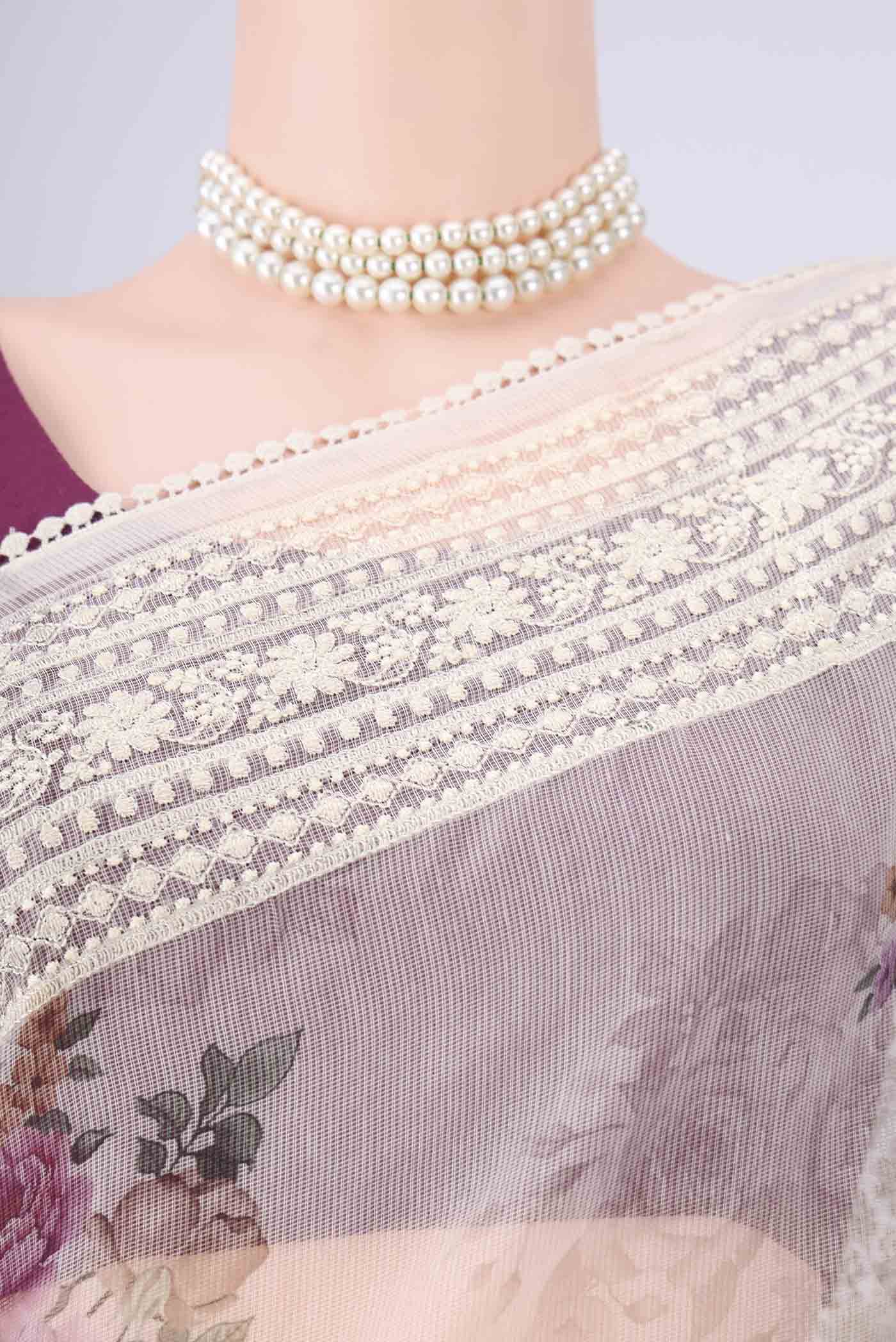 Border image of Off White Blended Kota Cotton Saree with Embroidery on the body and Embroidery Border. 