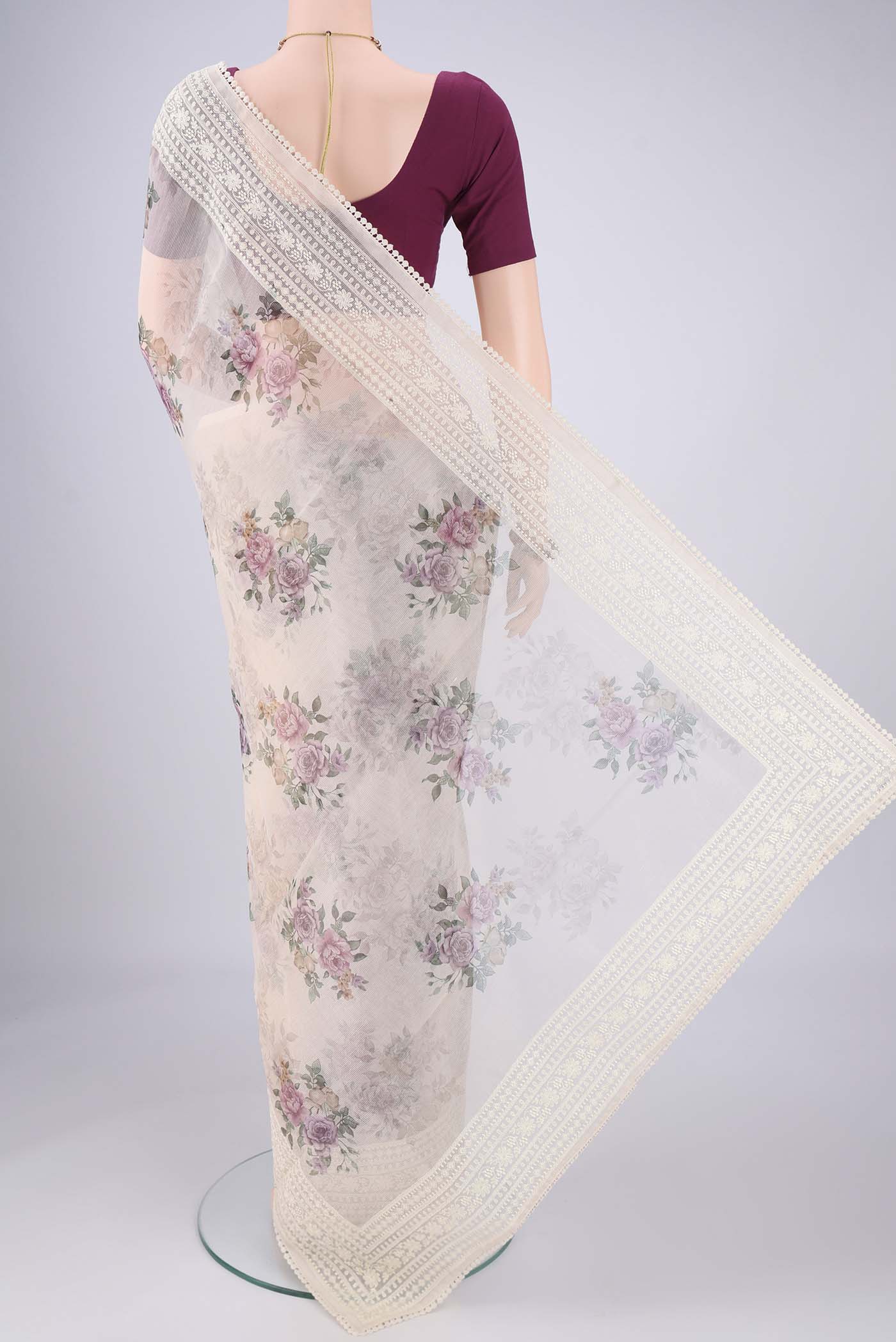Flat view of Off White Blended Kota Cotton Saree with Embroidery on the body and Embroidery Border. 