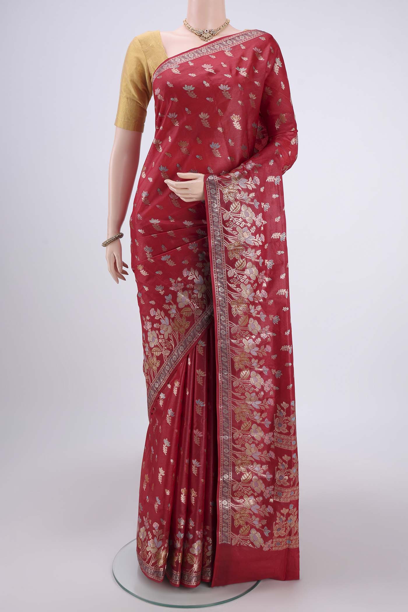 Orange Banarasi Tussar Silk Saree with Thread Brocade on the body and Zari And Thread Border.  displayed on a mannequin