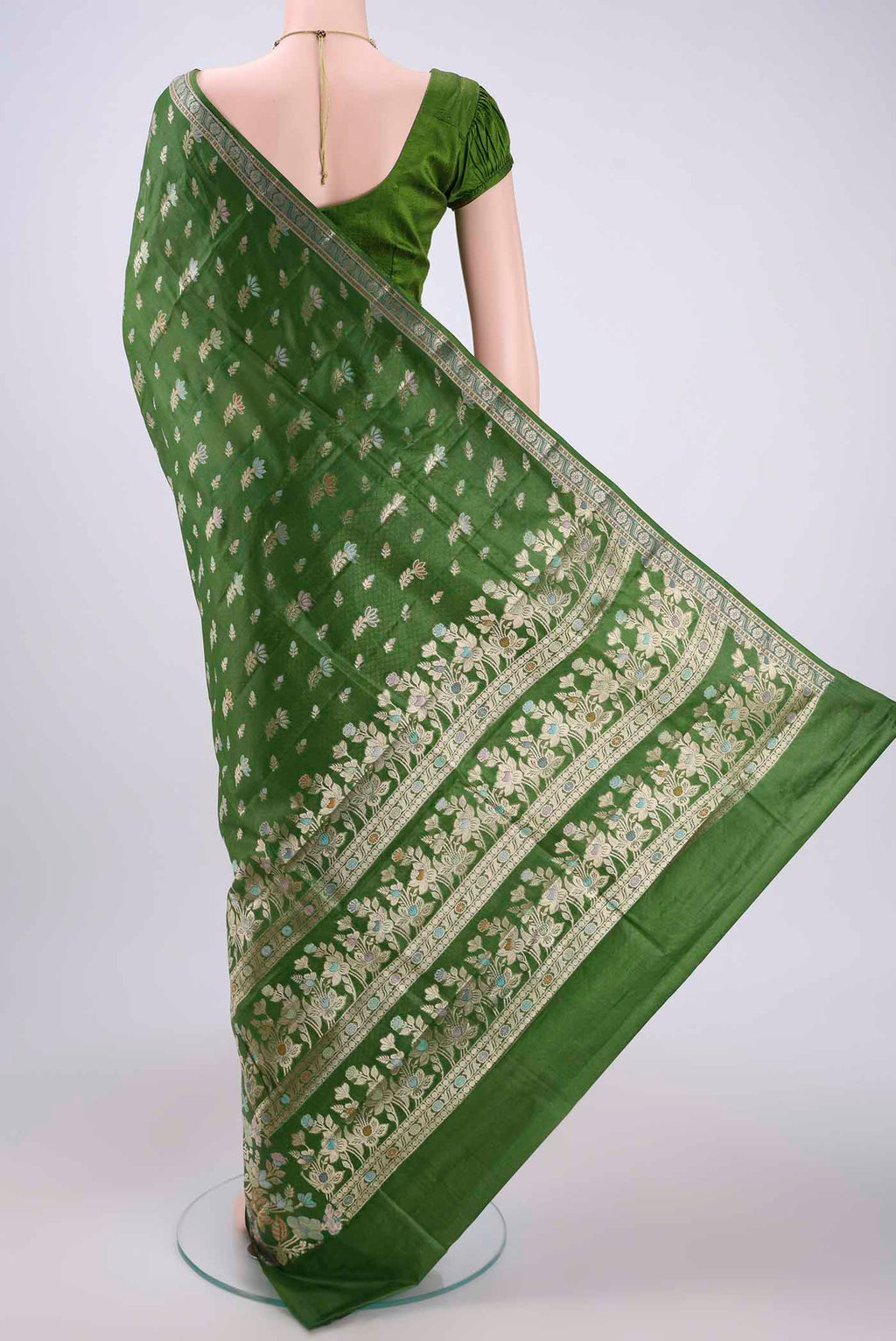 Flat view of Mehandi Green Banarasi Tussar Silk Saree with Zari And Thread Butta on the body and Zari And Thread Border. 
