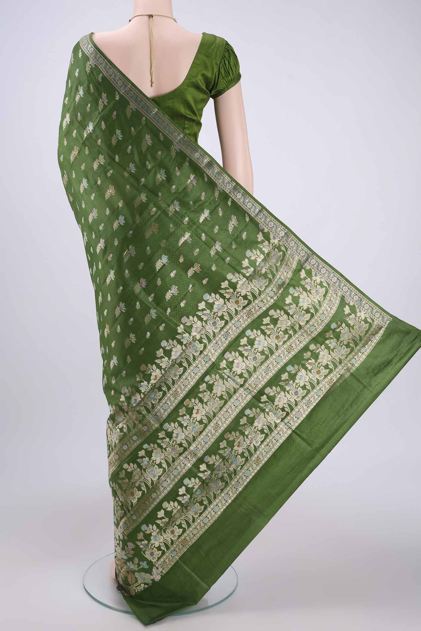 Flat view of Mehandi Green Banarasi Tussar Silk Saree with Zari And Thread Butta on the body and Zari And Thread Border. 