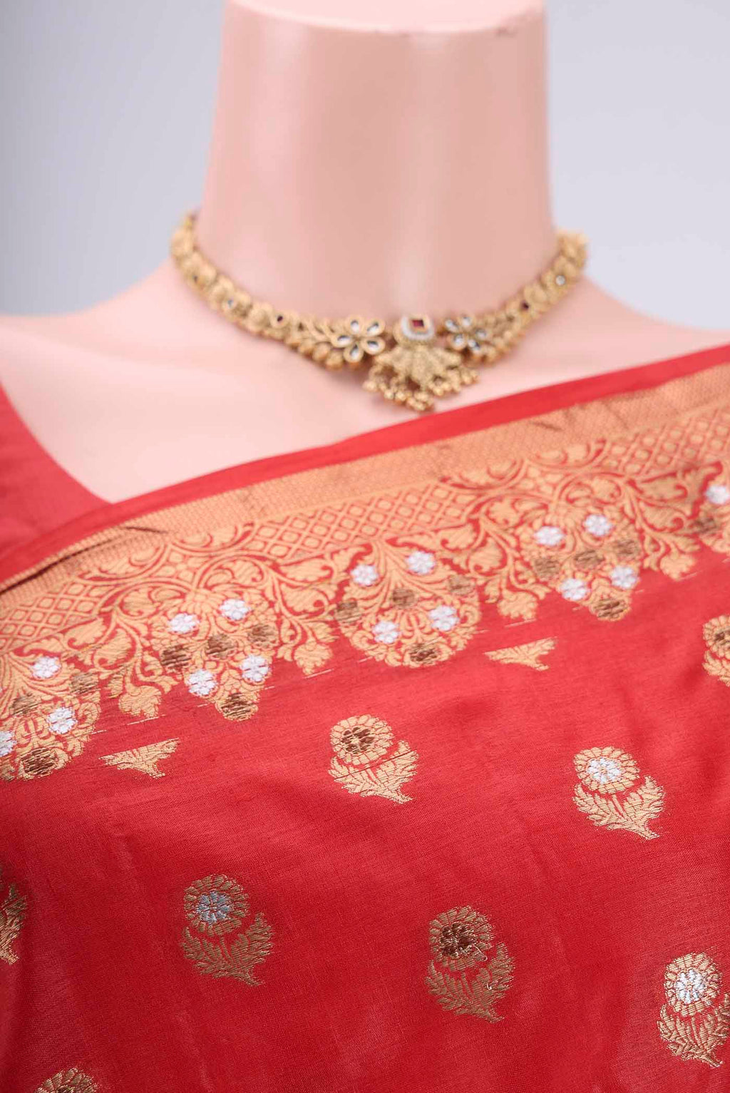 Border image of Orange Banarasi Tussar Silk Saree with Zari And Thread Butta on the body and Zari And Thread Border. 