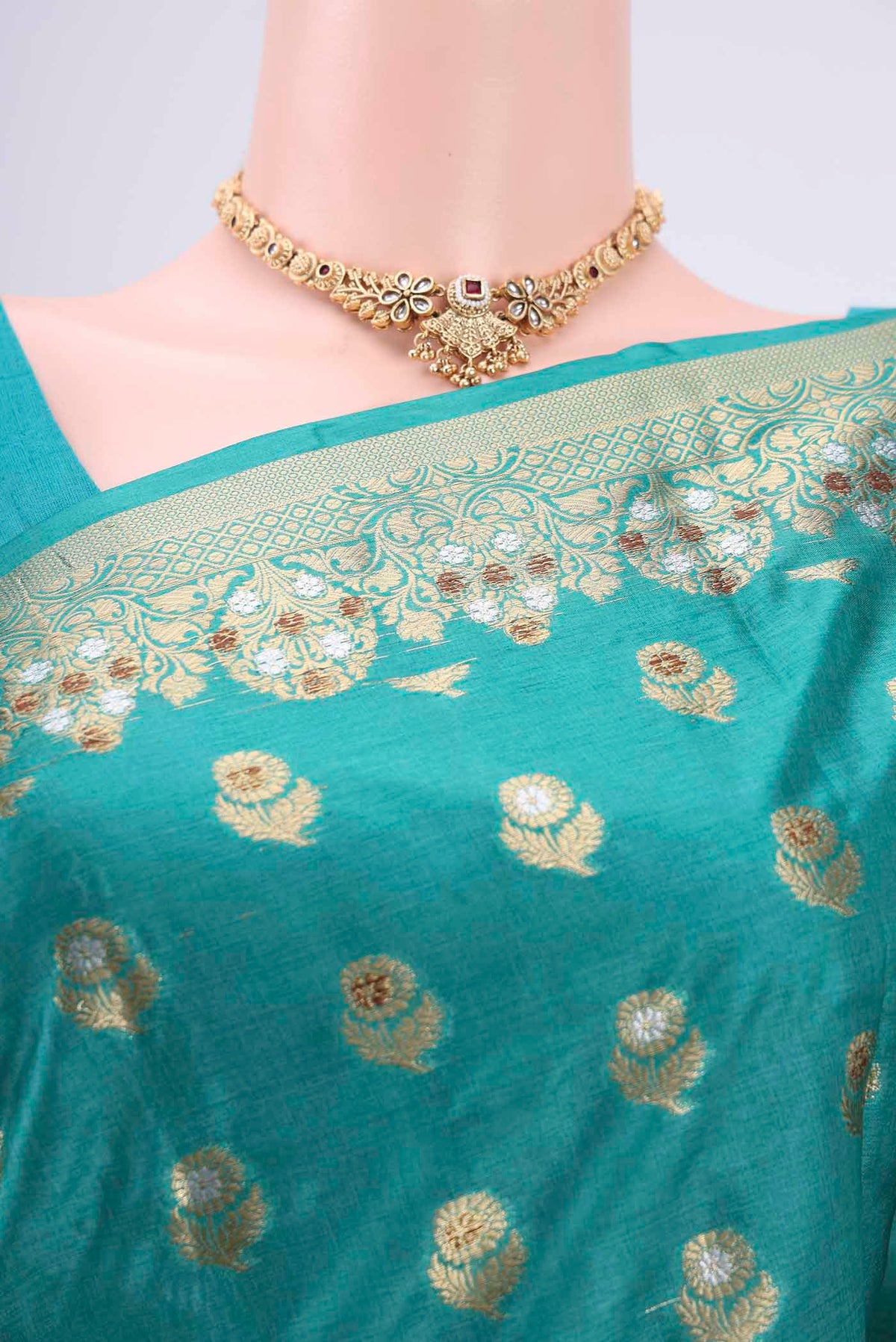 Border image of Turquoise Banarasi Tussar Silk Saree with Zari And Thread Butta on the body and Zari And Thread Border. 
